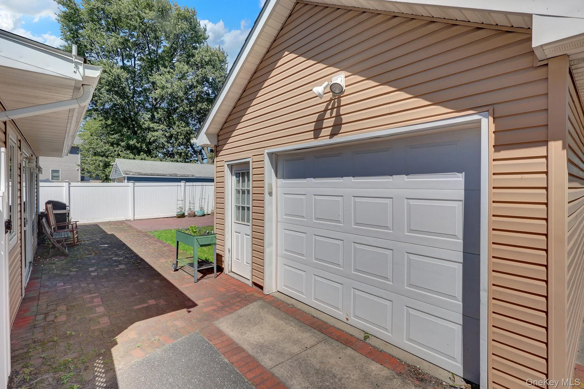 ONE CAR GARAGE WITH PLENTY OF SPACE PLUS ATTIC ONE CAR GARAGE WITH PLENTY OF SPACE PLUS ATTIC