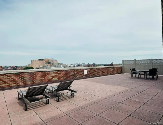 Common rooftop terrace with outdoor gathering space Common rooftop terrace with outdoor gathering space