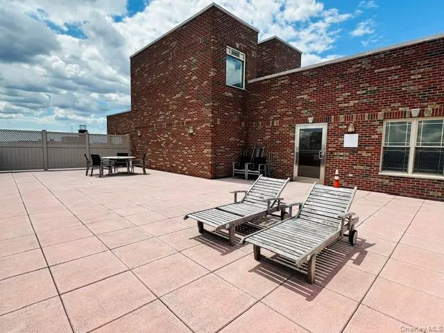 Rooftop terrace featuring a relaxing seating area Rooftop terrace featuring a relaxing seating area