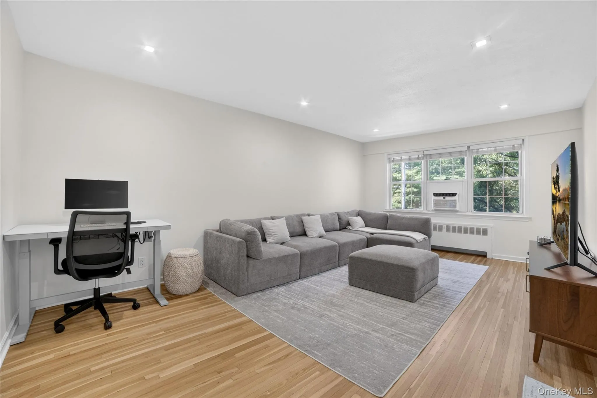 Living Room Features: Home Office Area, Recessed Lighting, Re-Finished Hardwood Floors, Grand Window View, Natural Light Living Room Features: Home Office Area, Recessed Lighting, Re-Finished Hardwood Floors, Grand Window View, Natural Light