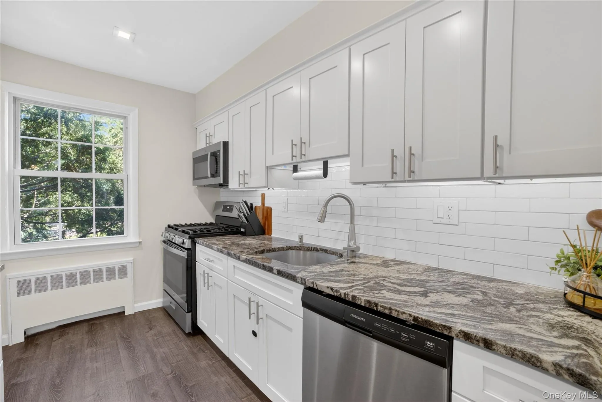Kitchen Features: New SS Appliances, Under-cabinet Lighting, Marble Countertops, Under-mount Sink, Pantry Kitchen Features: New SS Appliances, Under-cabinet Lighting, Marble Countertops, Under-mount Sink, Pantry