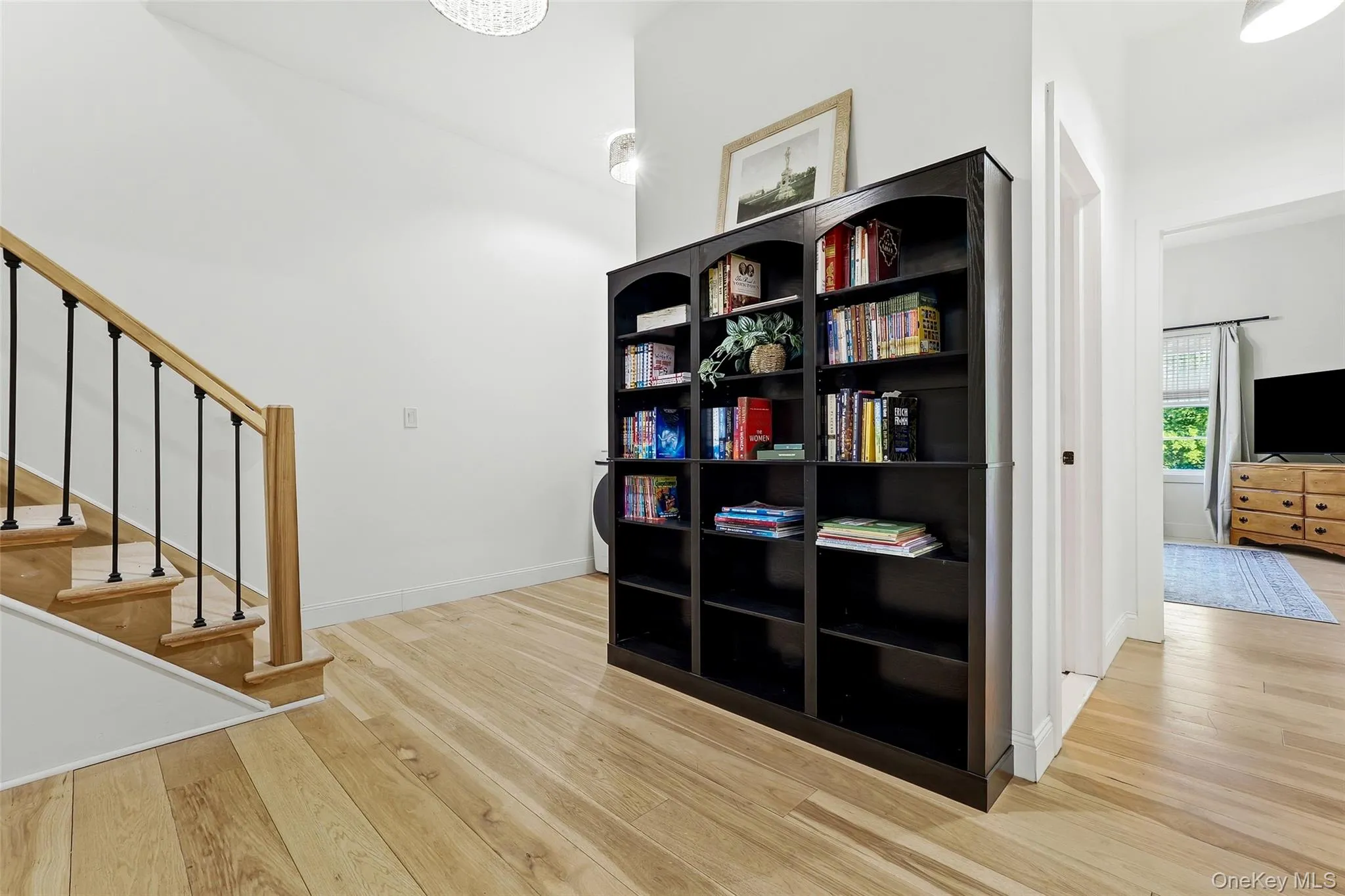 Flexible space ideal for a home office or reading area, with stairway access to the unfinished bonus roo above the garage Flexible space ideal for a home office or reading area, with stairway access to the unfinished bonus roo above the garage