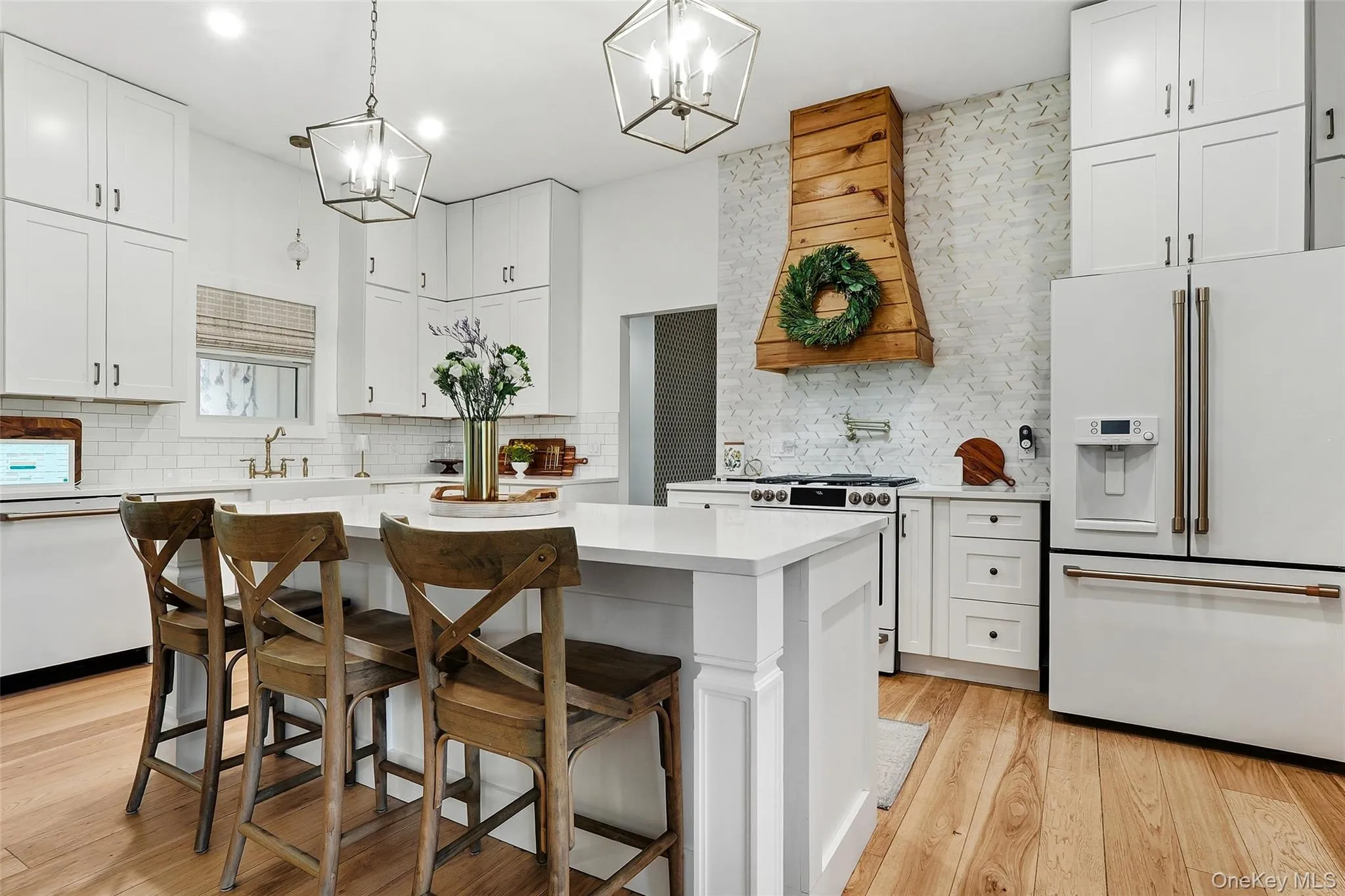Beautifully appointed kitchen with custom center island Beautifully appointed kitchen with custom center island