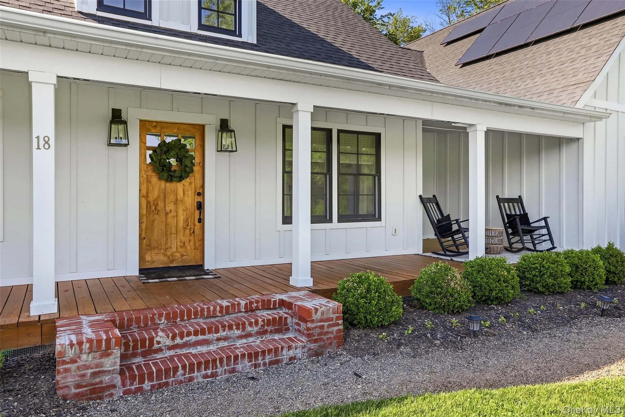 Welcoming covered front porch and inviting entryway Welcoming covered front porch and inviting entryway