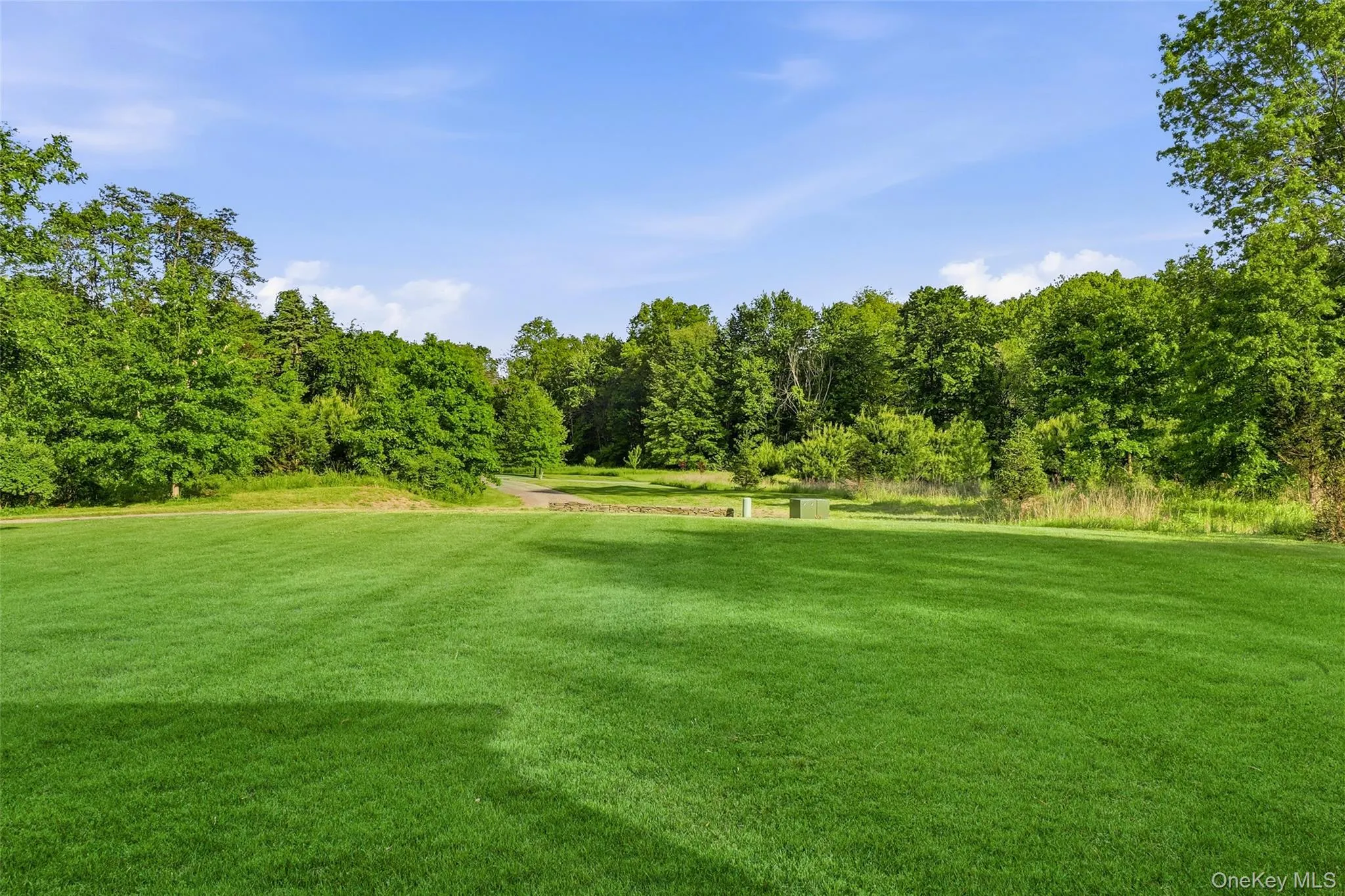Relax and take in the peaceful views from the welcoming wraparound front porch Relax and take in the peaceful views from the welcoming wraparound front porch