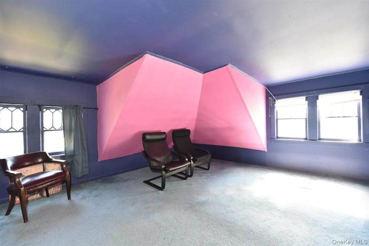 Living area with carpet Living area with carpet