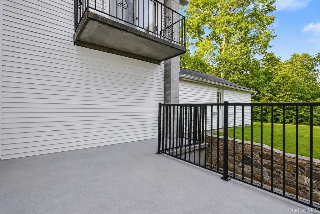 Primary bedroom deck/balcony up, patio off kitchen lower Primary bedroom deck/balcony up, patio off kitchen lower