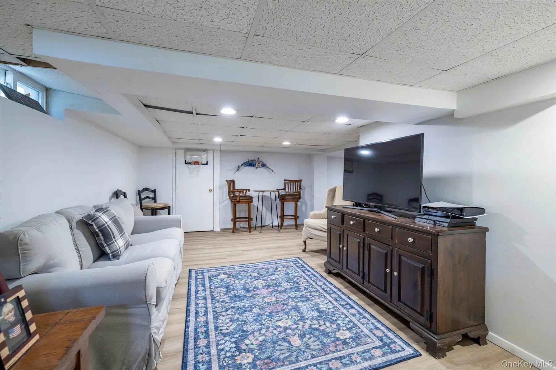 Partially finished basement provides extra living space Partially finished basement provides extra living space