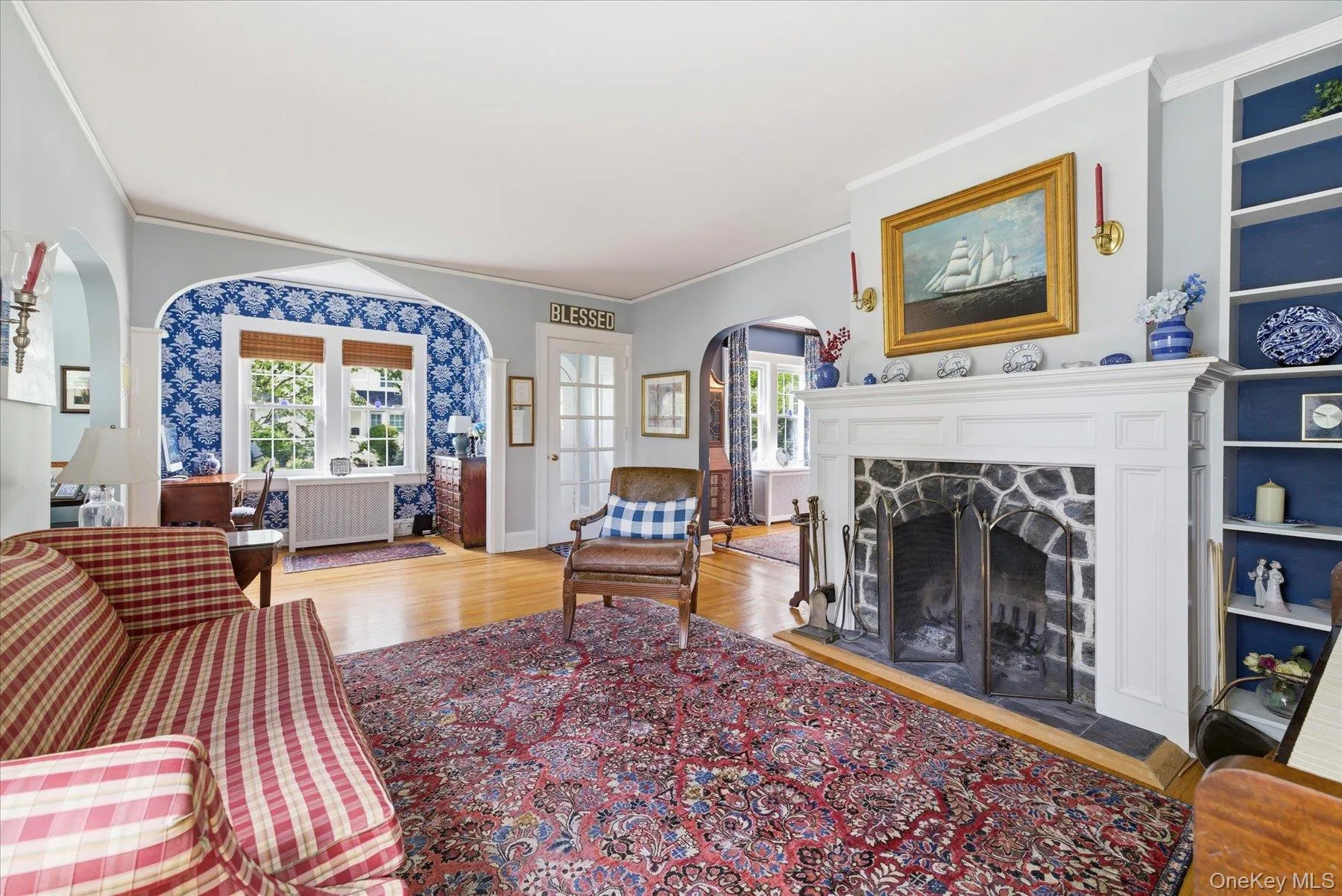Beautifully decorated living area with wood burning fireplace Beautifully decorated living area with wood burning fireplace