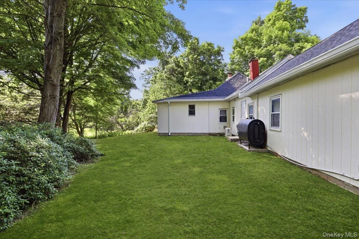 Back yard with new above ground oil tank Back yard with new above ground oil tank