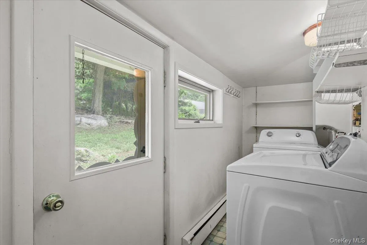 Laundry room off of kitchen Laundry room off of kitchen