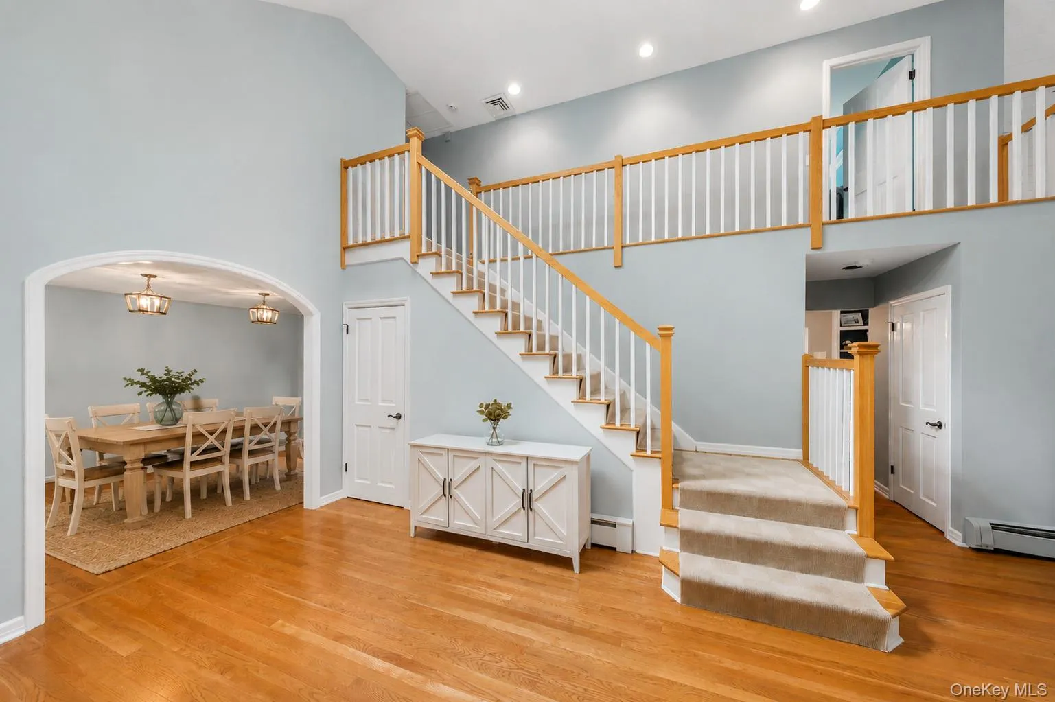 Virtually staged dining room to the left Virtually staged dining room to the left