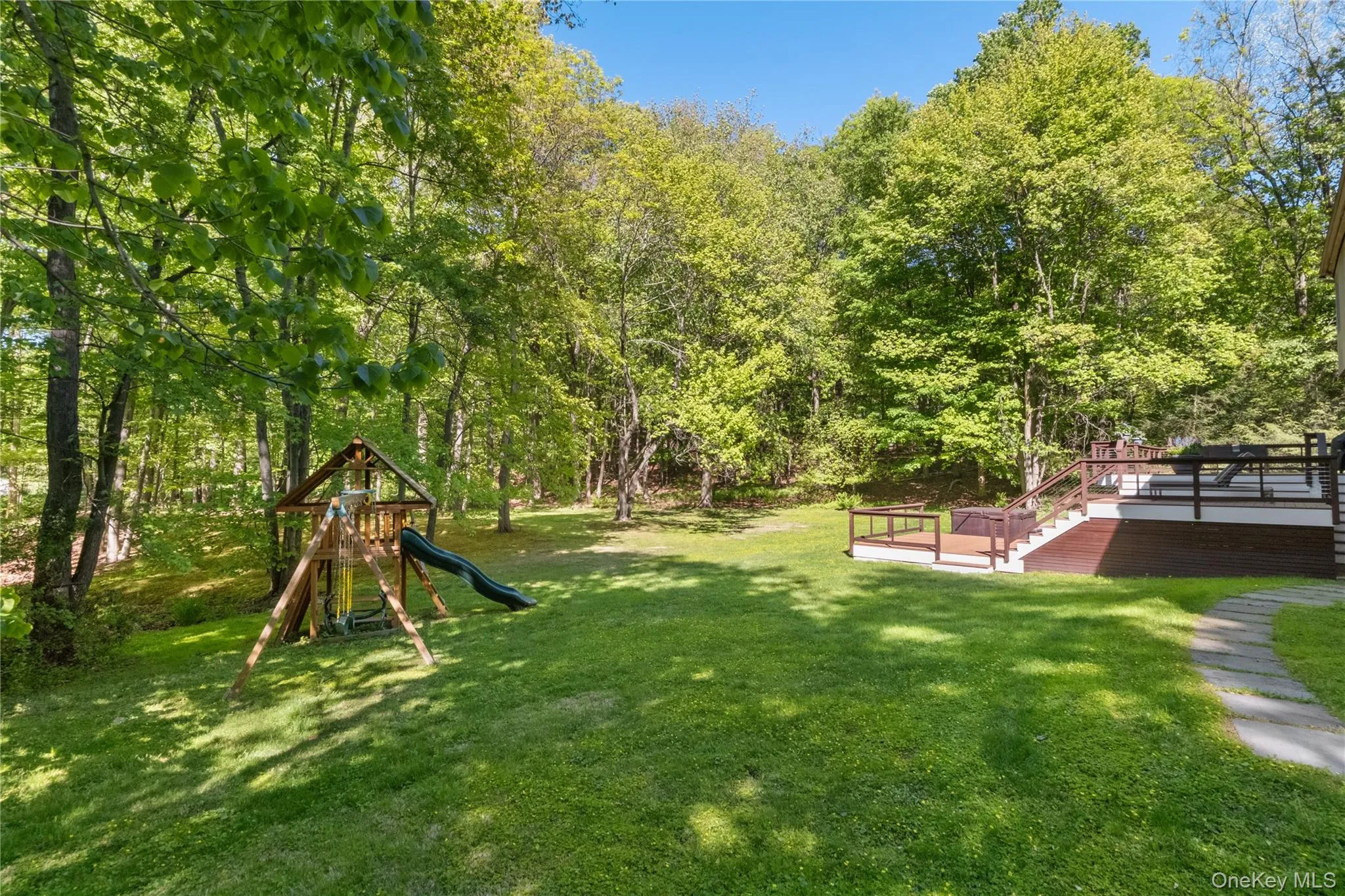 Large flat backyard with jungle gym Large flat backyard with jungle gym