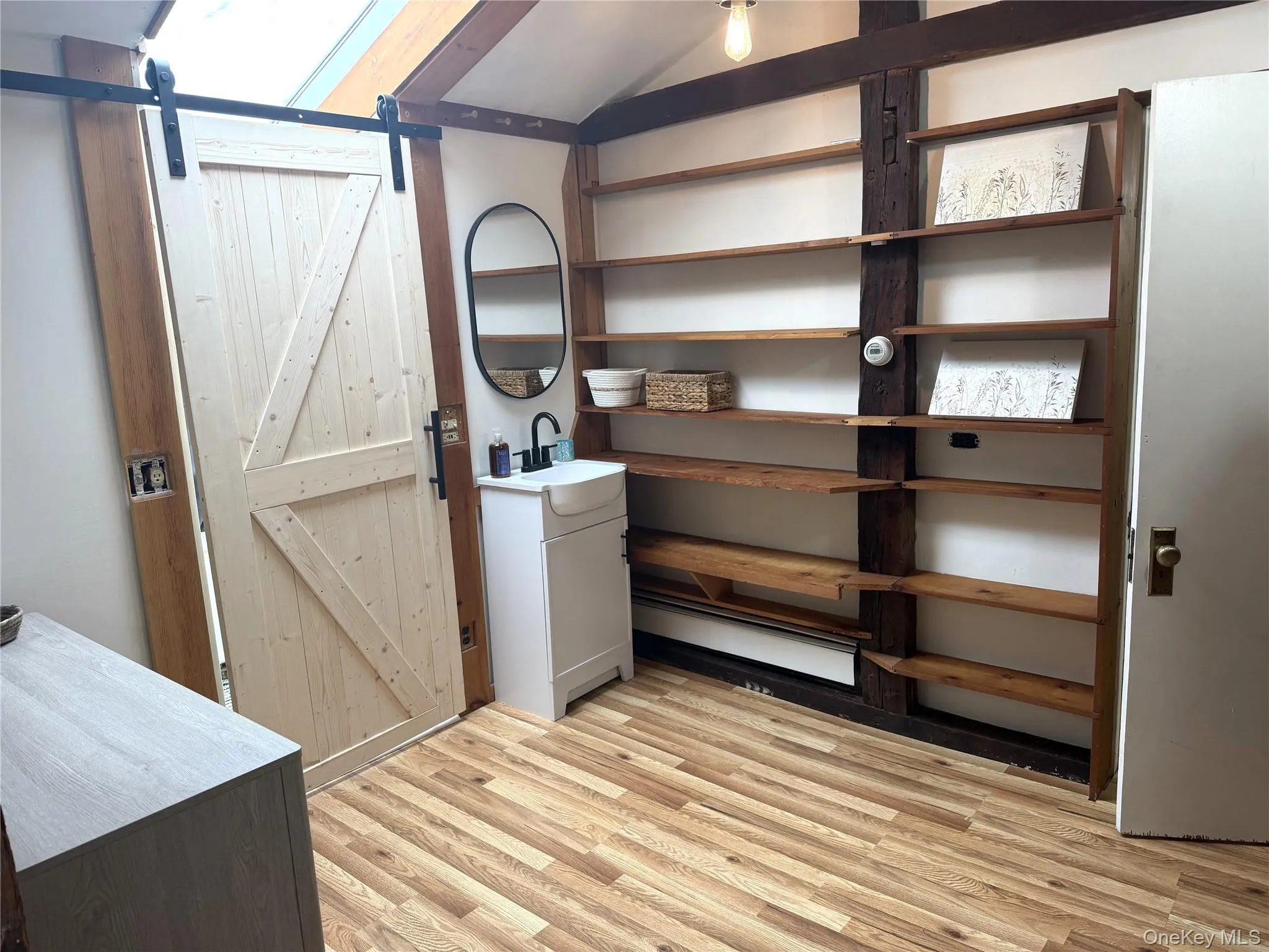 Upstairs bathroom has small shower, commode & sink. Legal half bath per town because sink outside door, but functions as full. Upstairs bathroom has small shower, commode & sink. Legal half bath per town because sink outside door, but functions as full.
