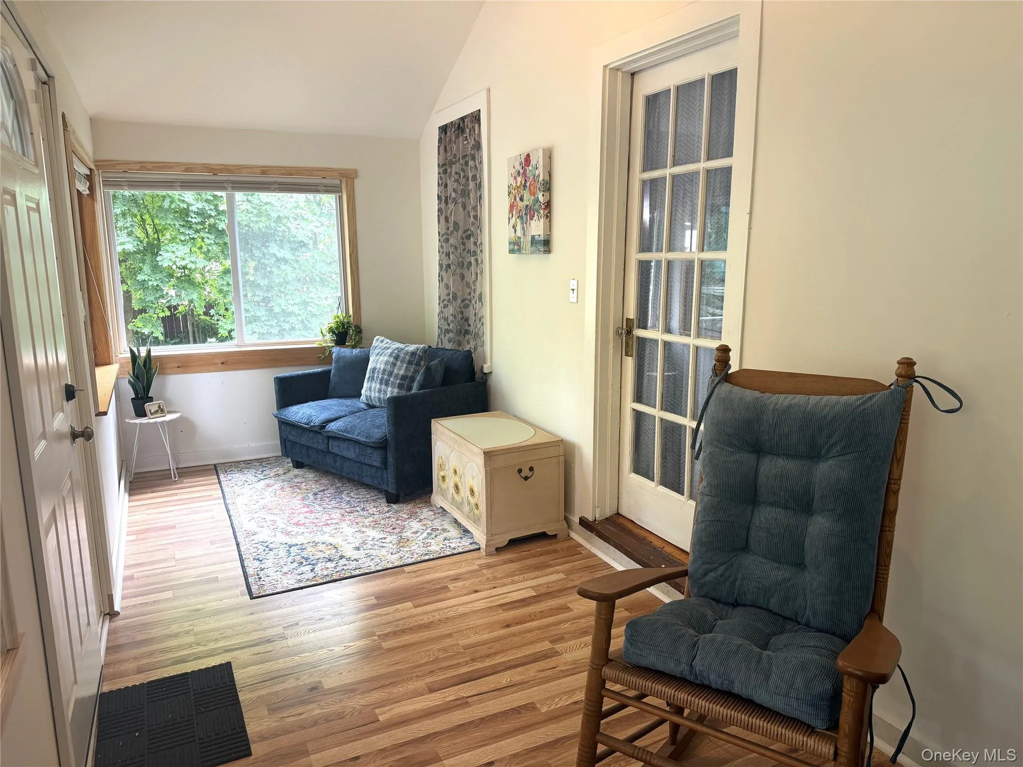 Front deck leads to cozy sunroom. Front deck leads to cozy sunroom.