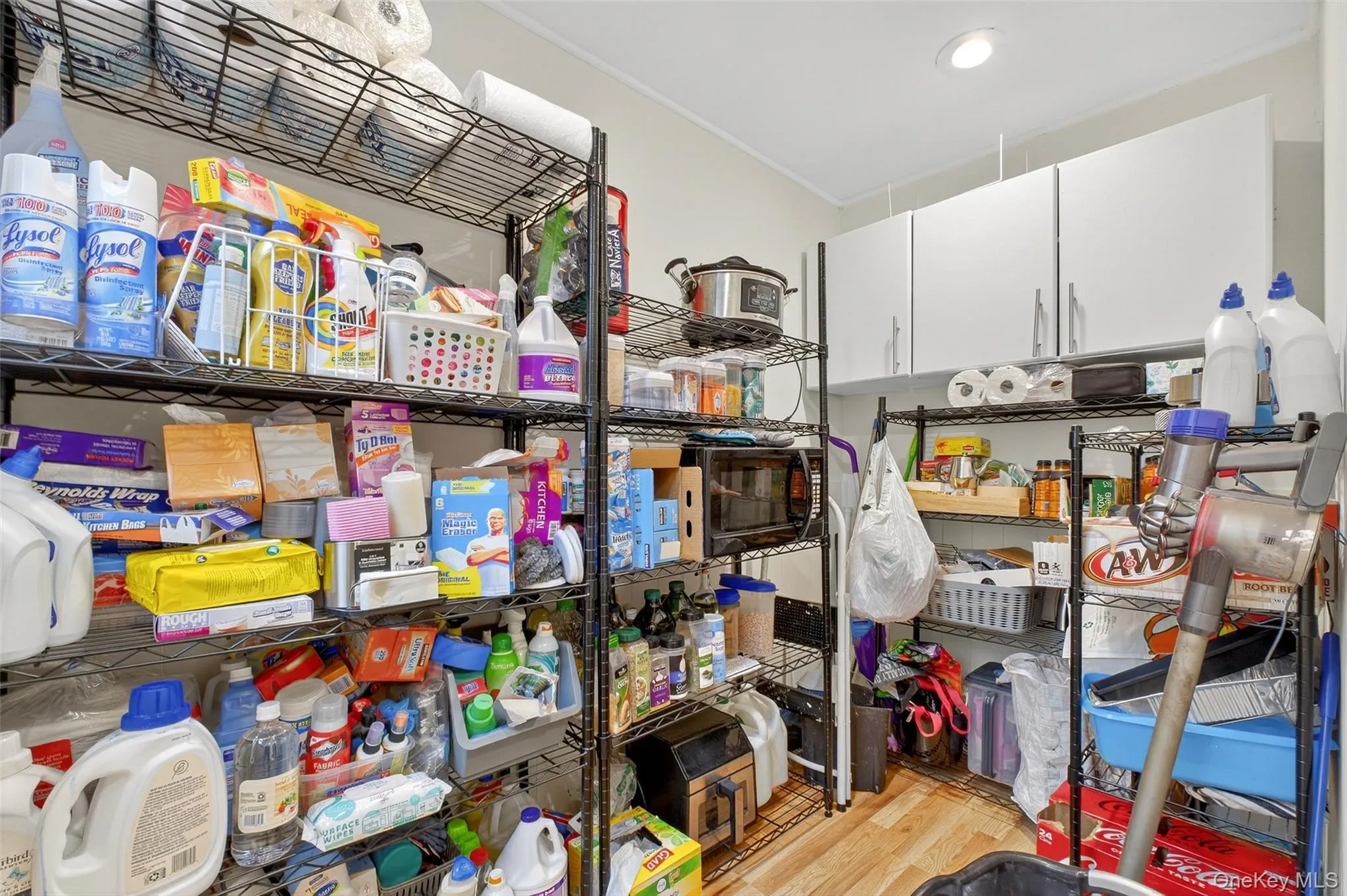 Overisized pantry closet w/radiant floor heating & shelving. Overisized pantry closet w/radiant floor heating & shelving.