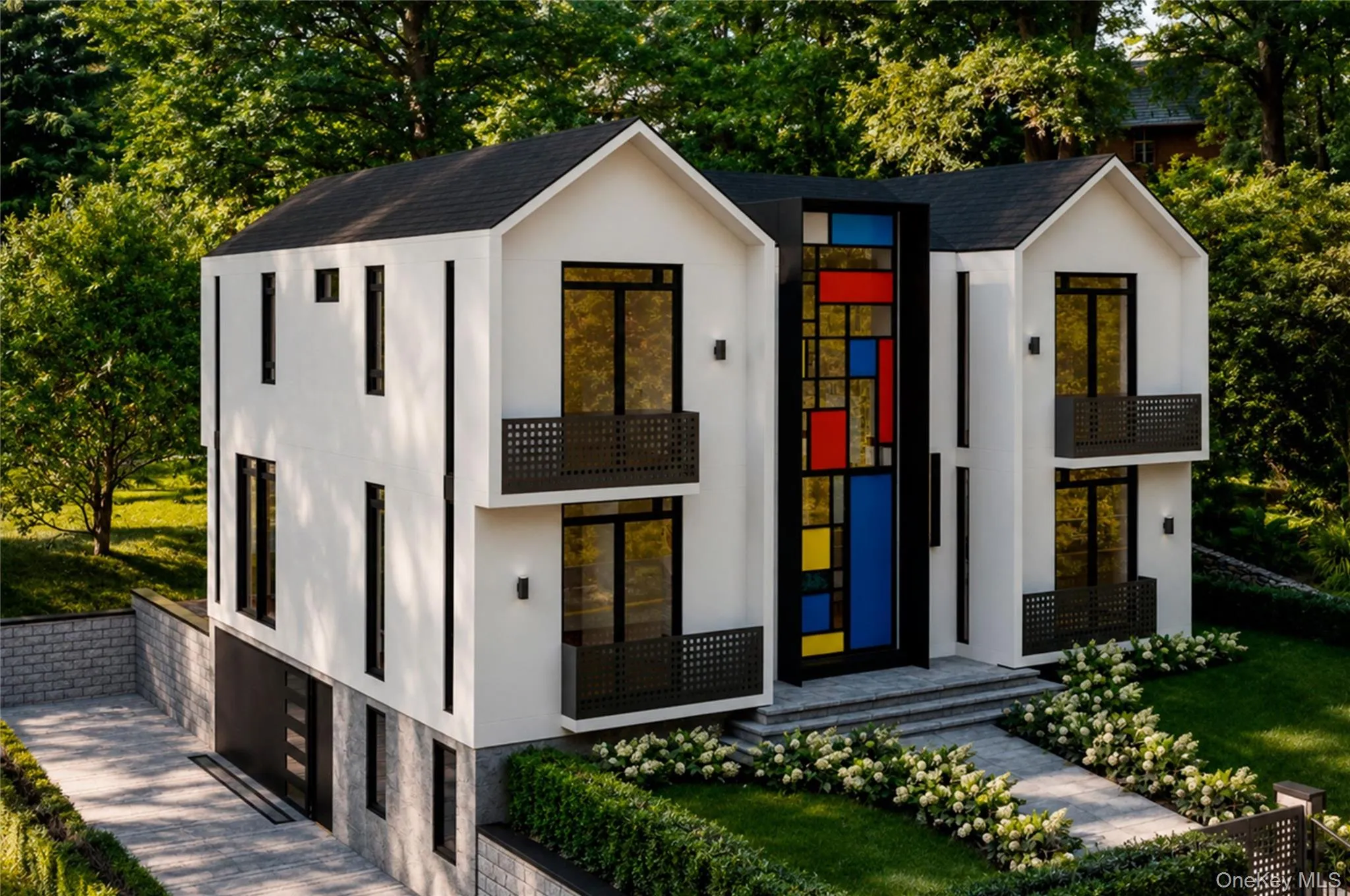 Modern luxury home with an attached two car garage with an extended driveway. Modern luxury home with an attached two car garage with an extended driveway.