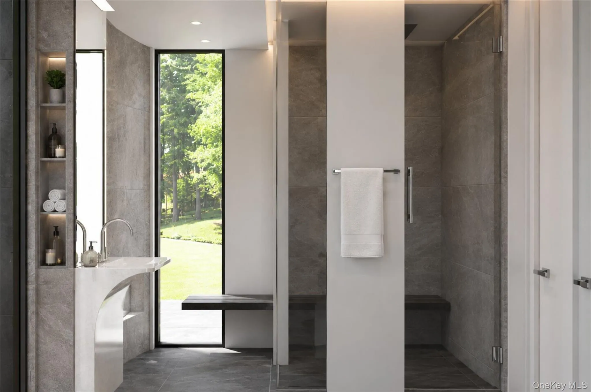 En-suite primary bathroom with radiant floors. En-suite primary bathroom with radiant floors.
