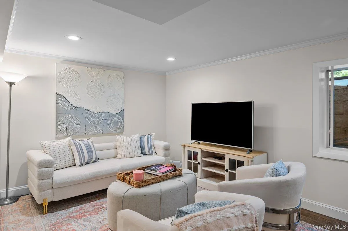 The lower level is cozy, yet bright with natural light in the space as well as updated recessed lighting throughout. The lower level is cozy, yet bright with natural light in the space as well as updated recessed lighting throughout.