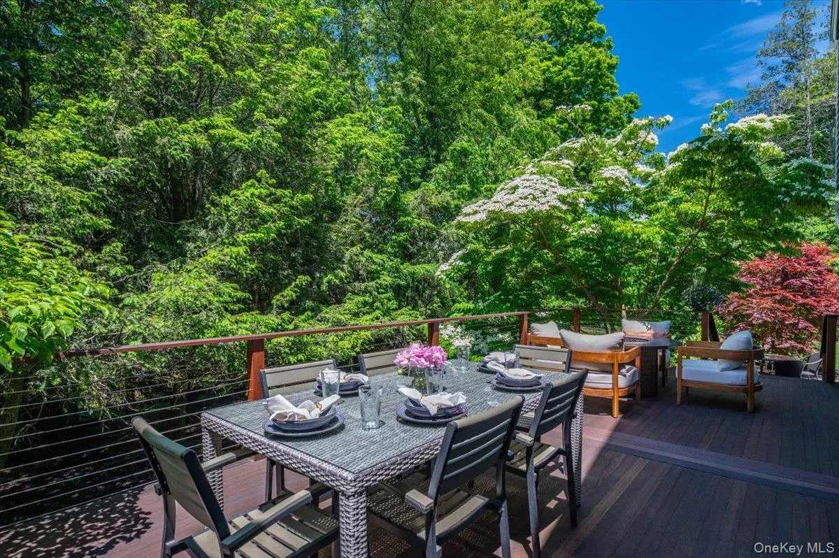 Back deck with fire pit, perfect for entertaining. Back deck with fire pit, perfect for entertaining.
