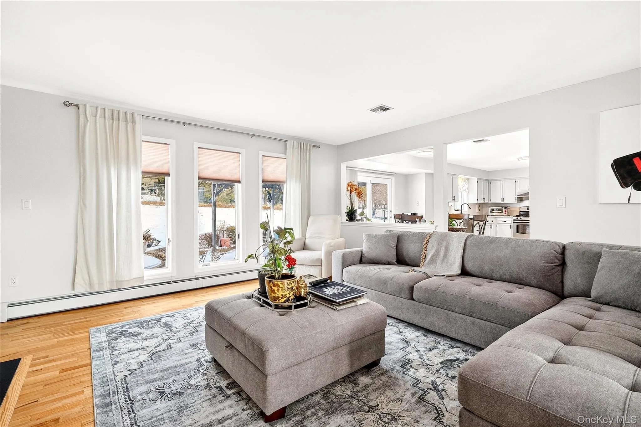 with light wood finished floors and baseboards with light wood finished floors and baseboards