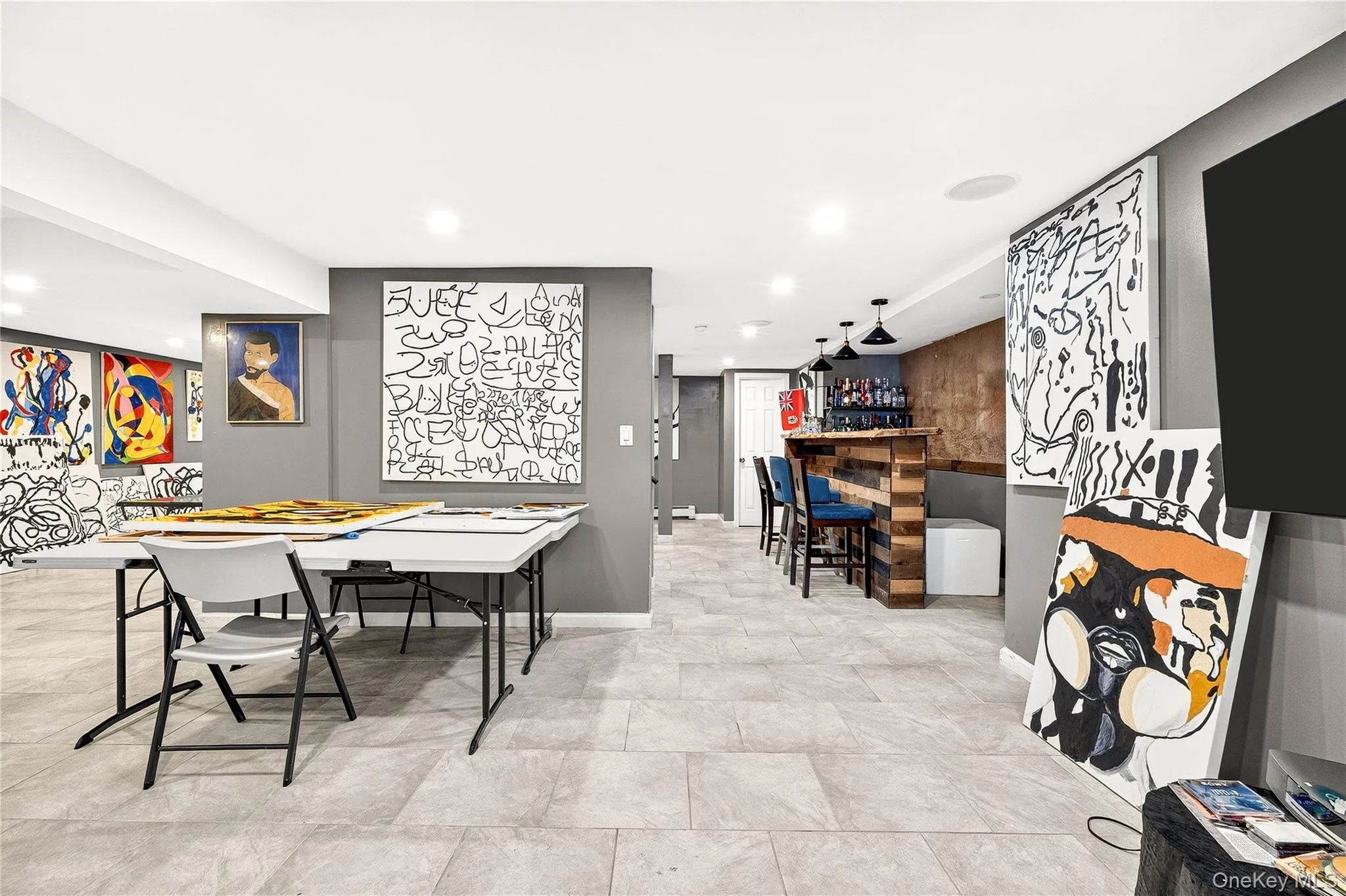 Playroom with recessed lighting and bar area Playroom with recessed lighting and bar area