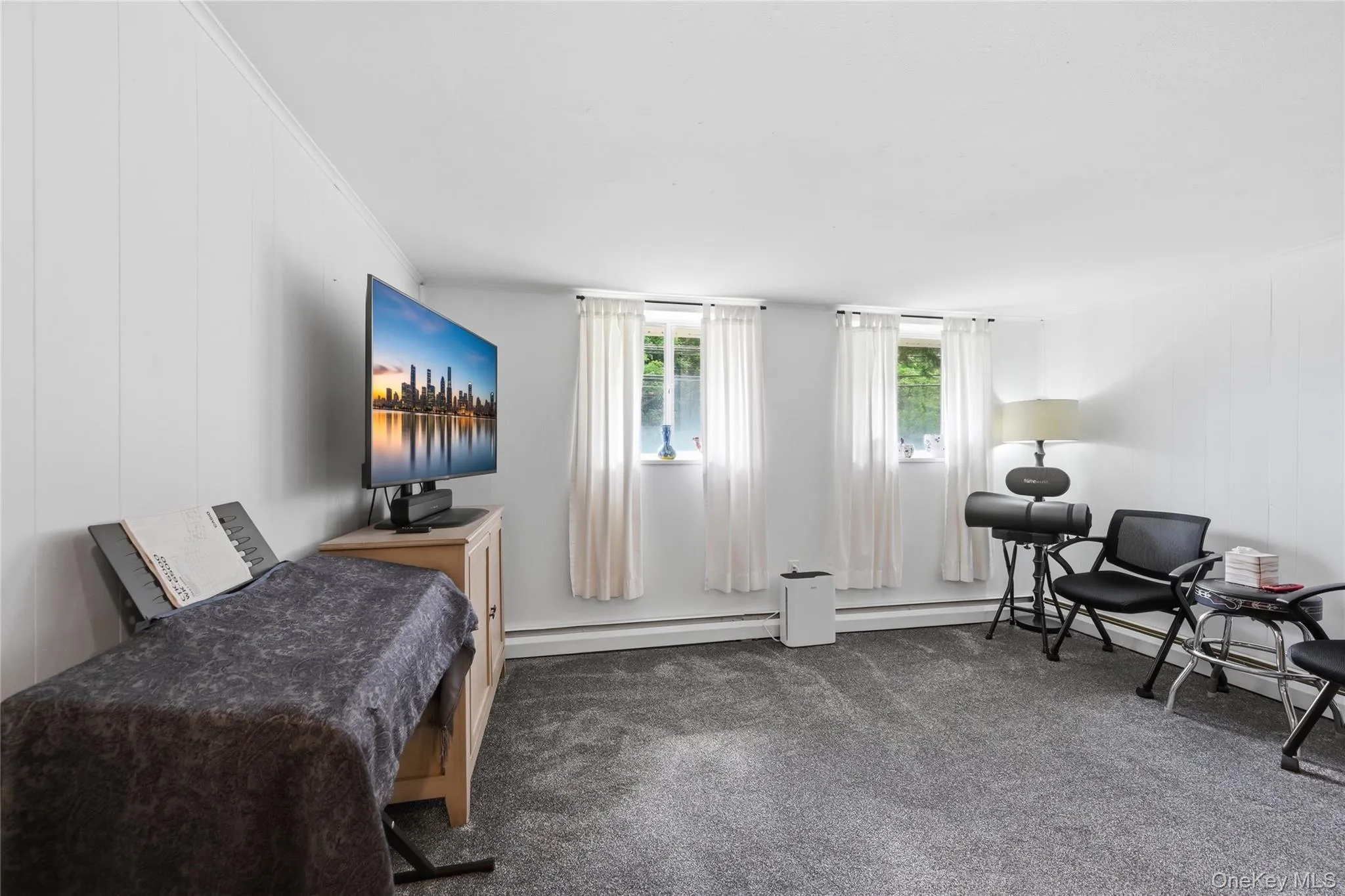 Lower level den with wall to wall carpet Lower level den with wall to wall carpet