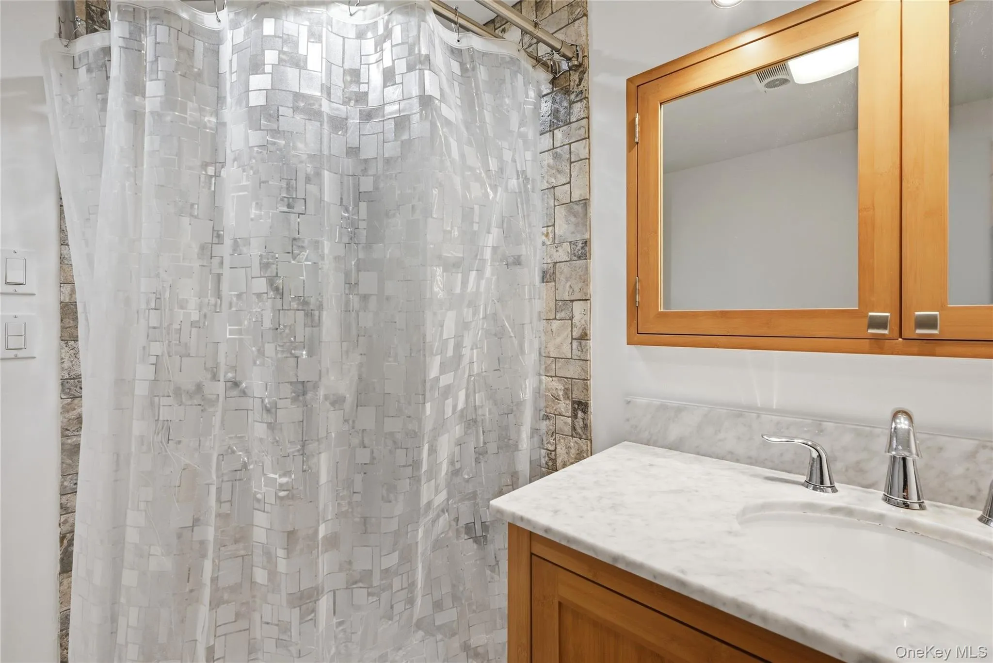 Lower level bath with single vanity Lower level bath with single vanity