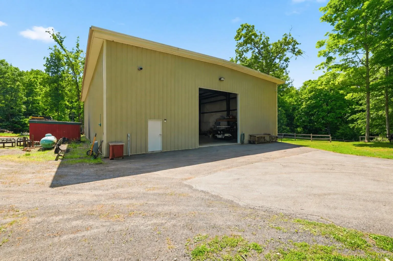 Equestrian enthusiasts will appreciate the substantial two-story barn currently configured for five horses with room for expansion, along with a massive hay loft, multiple fenced paddocks, and supporting outbuildings. A separate mechanic's garage and workshop sits farther down the drive, providing privacy and flexibility for hobbyists, collectors, or business pursuits. Equestrian enthusiasts will appreciate the substantial two-story barn currently configured for five horses with room for expansion, along with a massive hay loft, multiple fenced paddocks, and supporting outbuildings. A separate mechanic's garage and workshop sits farther down the drive, providing privacy and flexibility for hobbyists, collectors, or business pursuits.