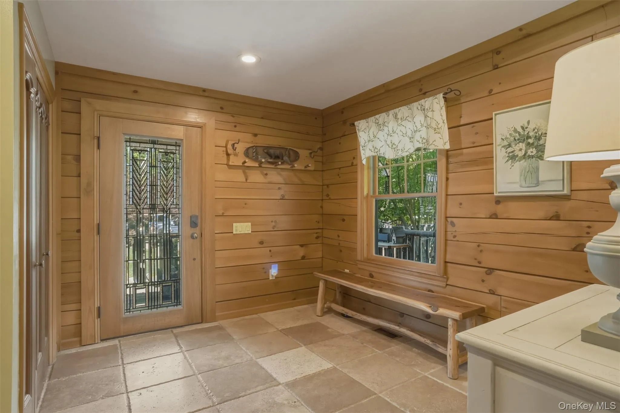Mudroom with dog washing station tucked into the closet Mudroom with dog washing station tucked into the closet