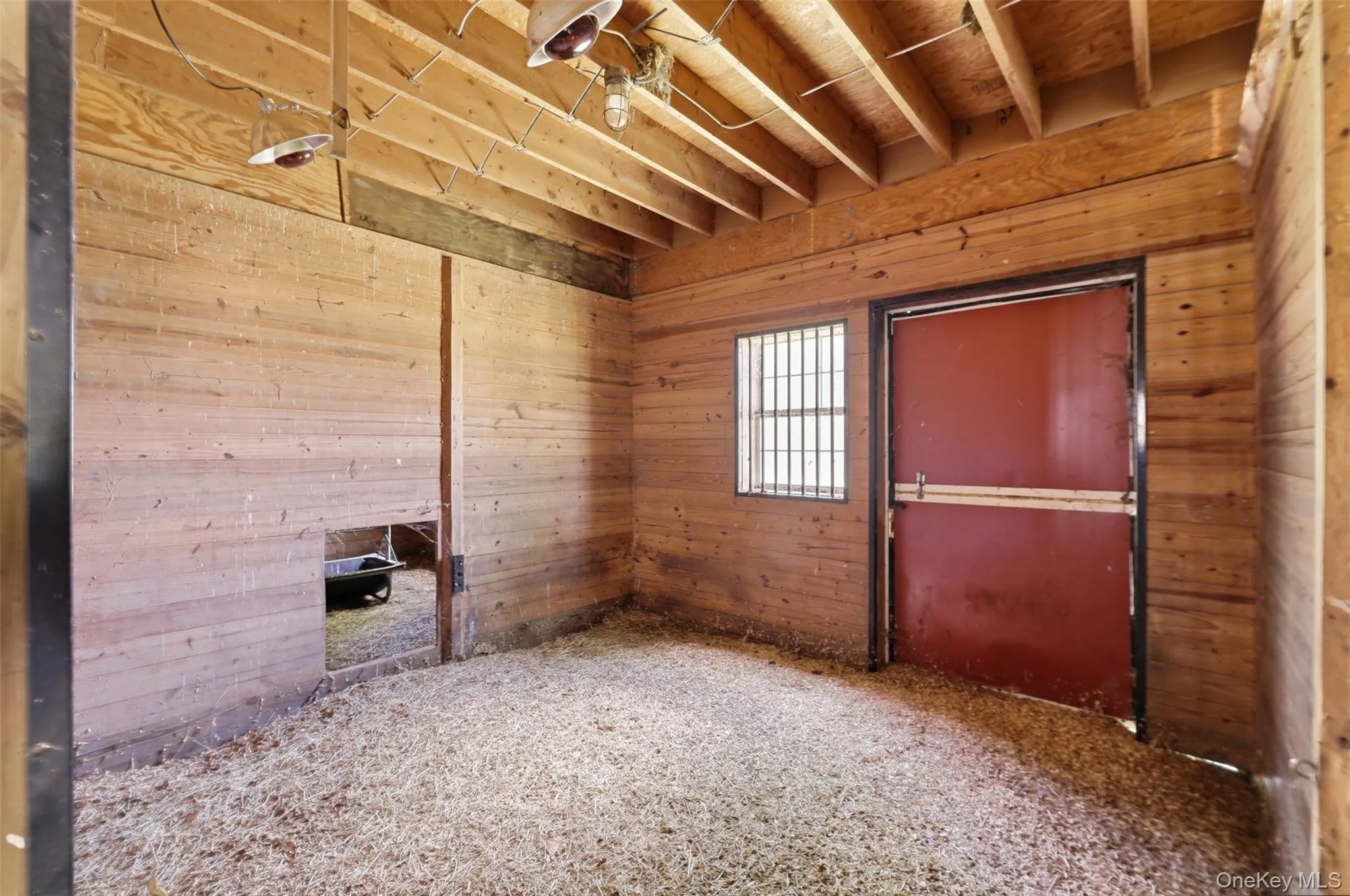 Equestrian enthusiasts will appreciate the substantial two-story barn currently configured for five horses with room for expansion, along with a massive hay loft, multiple fenced paddocks, and supporting outbuildings. A separate mechanic's garage and workshop sits farther down the drive, providing privacy and flexibility for hobbyists, collectors, or business pursuits. Equestrian enthusiasts will appreciate the substantial two-story barn currently configured for five horses with room for expansion, along with a massive hay loft, multiple fenced paddocks, and supporting outbuildings. A separate mechanic's garage and workshop sits farther down the drive, providing privacy and flexibility for hobbyists, collectors, or business pursuits.