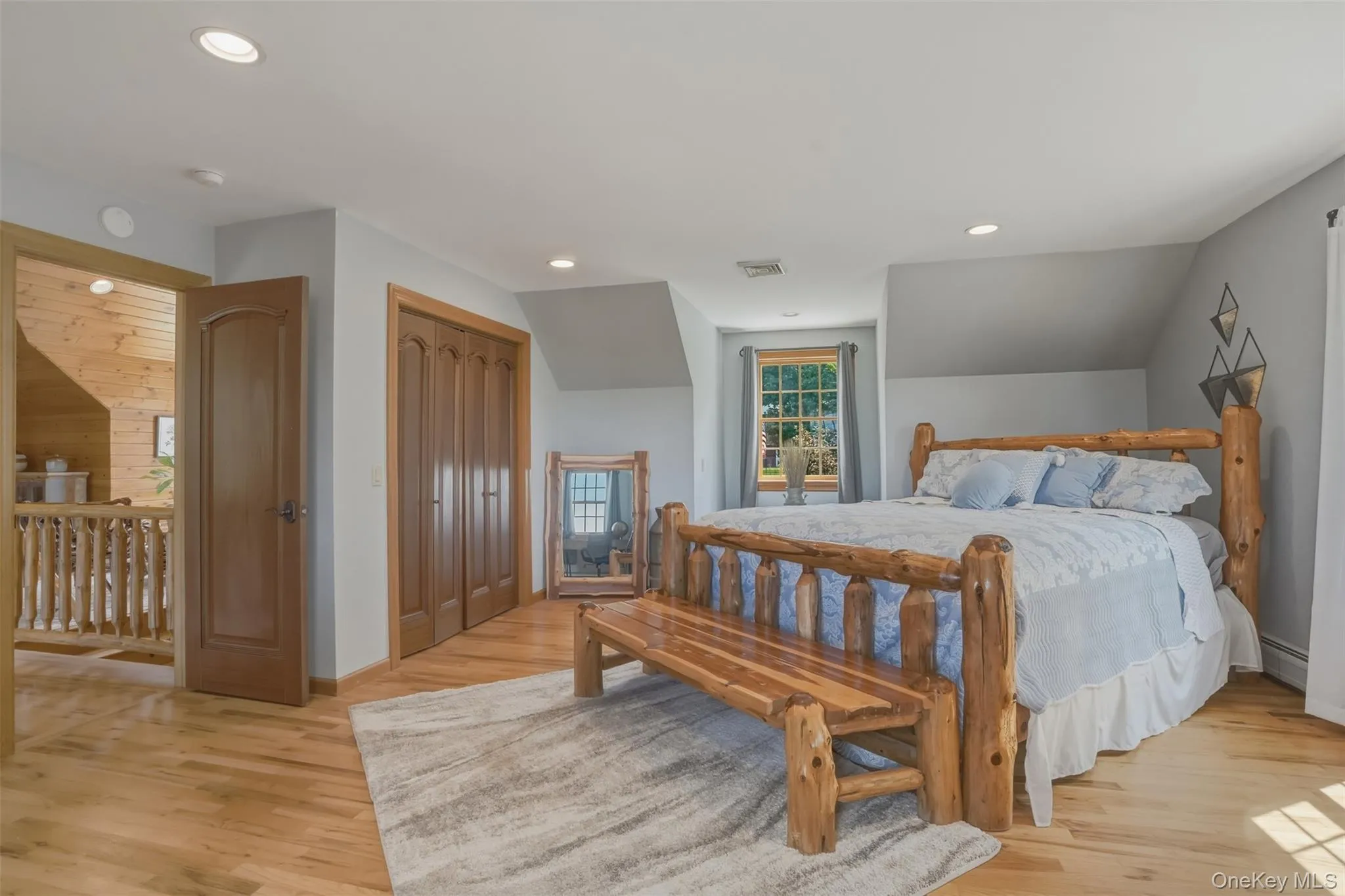 Upstairs, two generously sized bedrooms share a full bath, while a peaceful loft-style sitting area overlooks both the great room below and the picturesque grounds beyond. Upstairs, two generously sized bedrooms share a full bath, while a peaceful loft-style sitting area overlooks both the great room below and the picturesque grounds beyond.