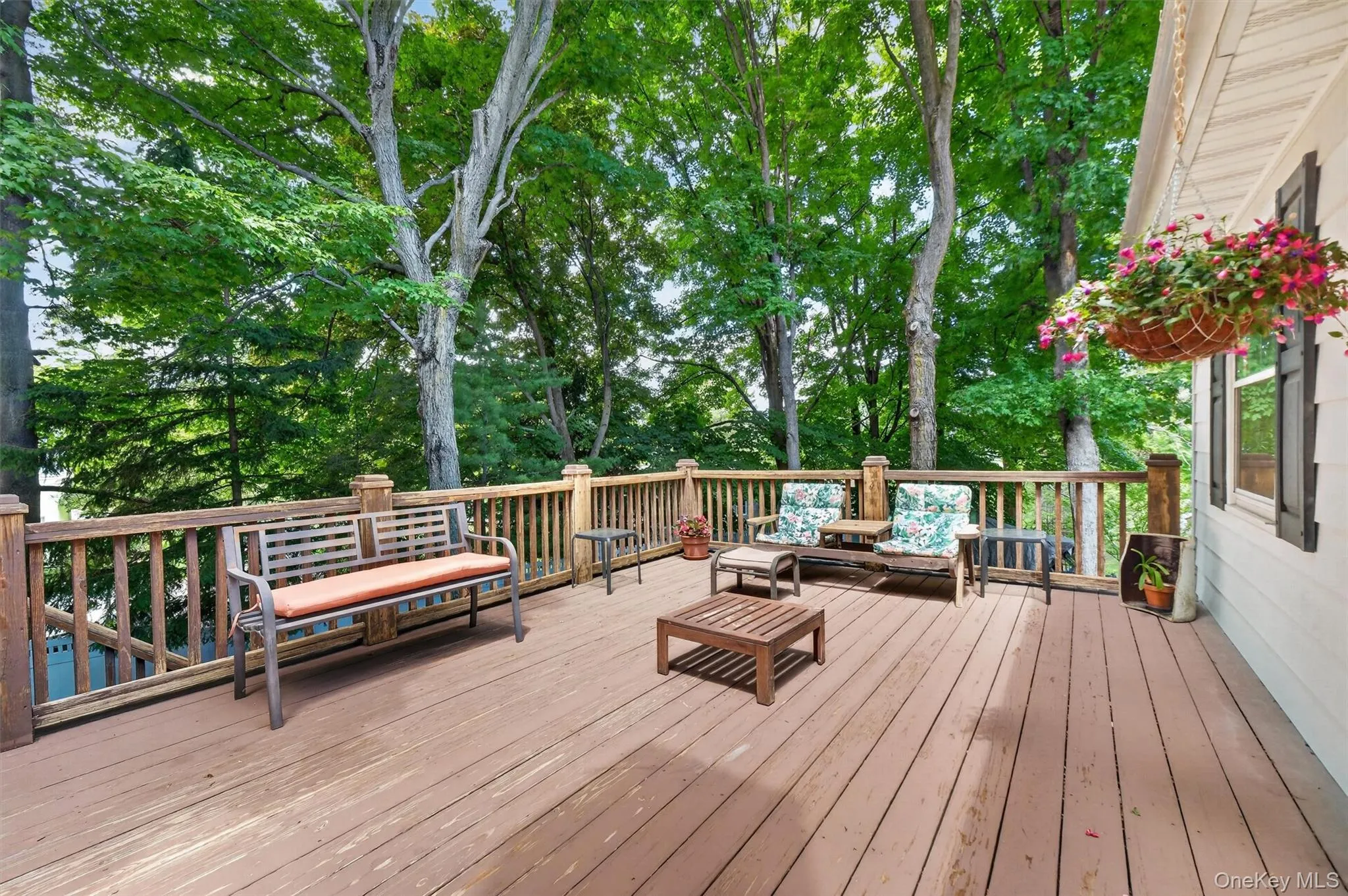 Spacious wood deck with perimeter railing Spacious wood deck with perimeter railing
