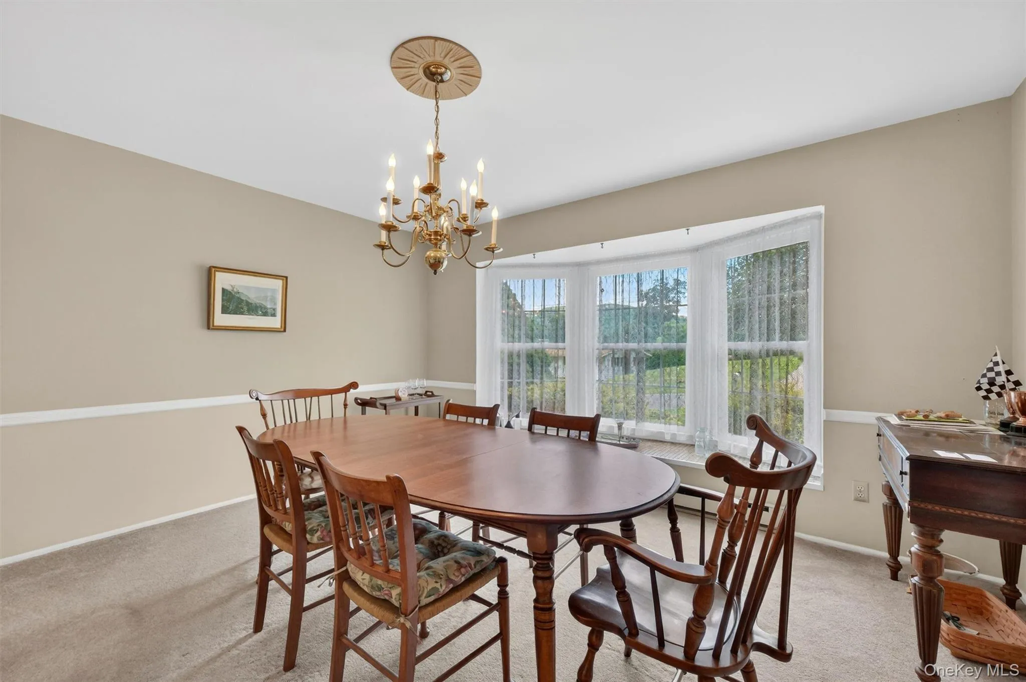 Formal Dining room: The Bay window overlooks the front yard with abundant south / southeasterly light. Formal Dining room: The Bay window overlooks the front yard with abundant south / southeasterly light.