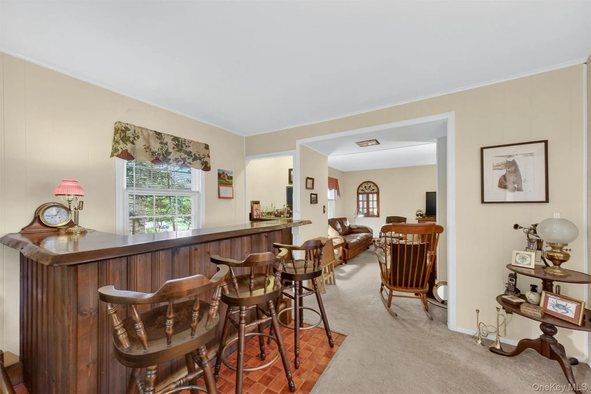 Bar room is spacious with classic wet bar. It's adjacent to both the formal living room and the den/family room. Time for the party! Bar room is spacious with classic wet bar. It's adjacent to both the formal living room and the den/family room. Time for the party!