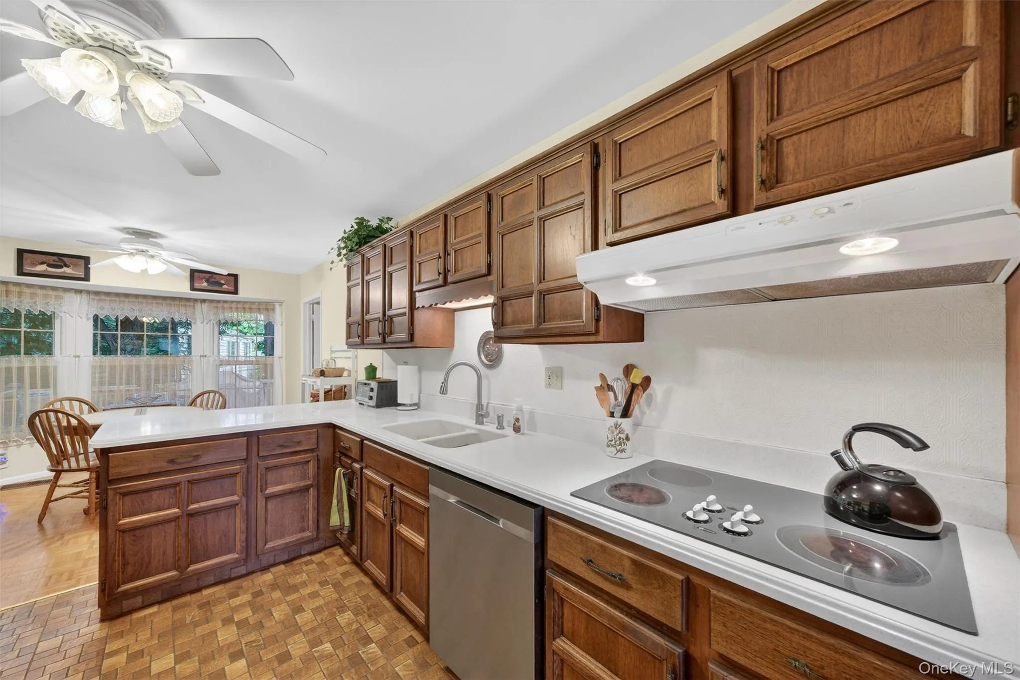 The large, eat it kitchen is has updated appliances with great flow in the workspace and to the dining room, den / family room, back deck, garage and the main level suite. The large, eat it kitchen is has updated appliances with great flow in the workspace and to the dining room, den / family room, back deck, garage and the main level suite.