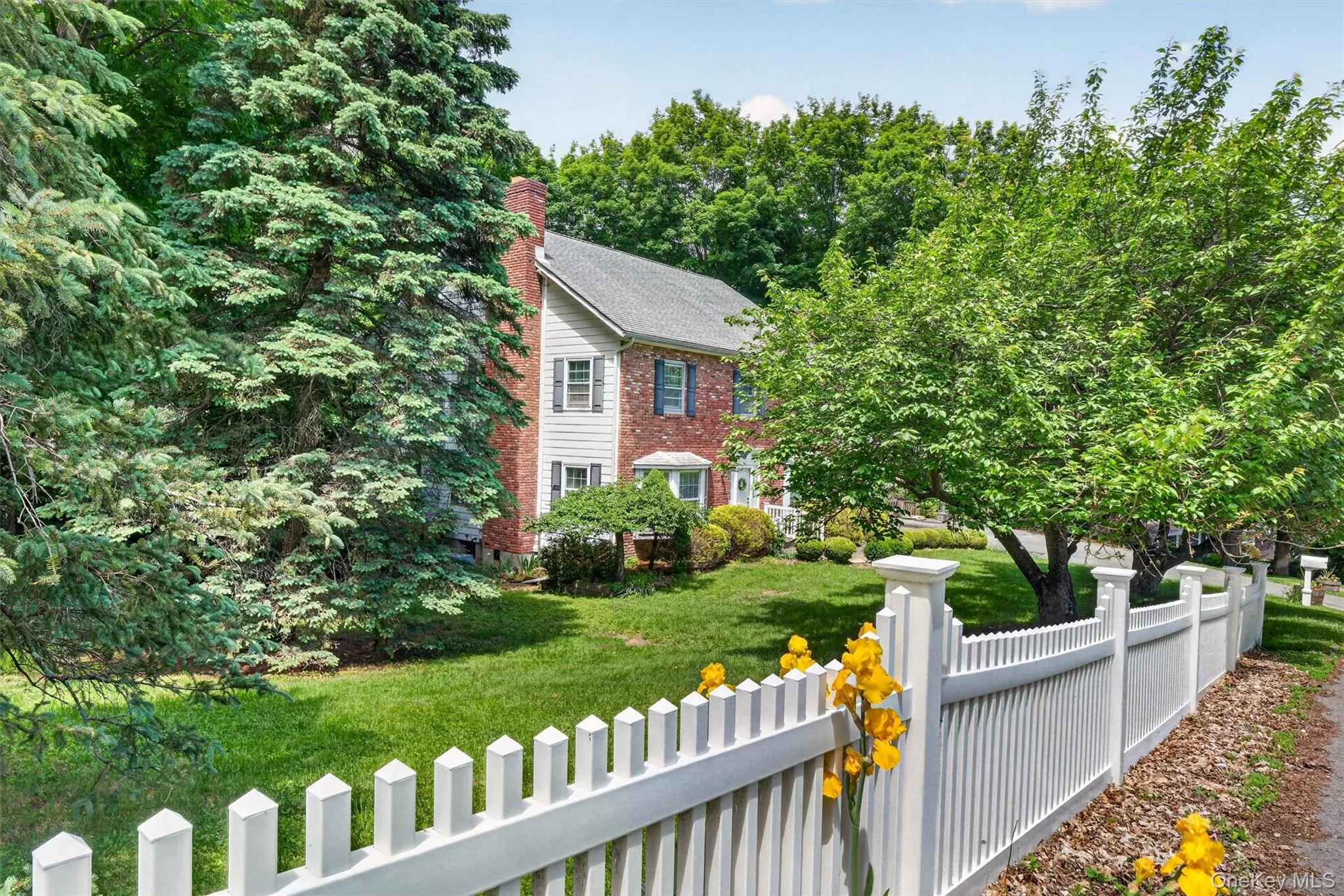 View of home from Taft place. The front offers picket fence and the rear yard has a privacy fence. View of home from Taft place. The front offers picket fence and the rear yard has a privacy fence.