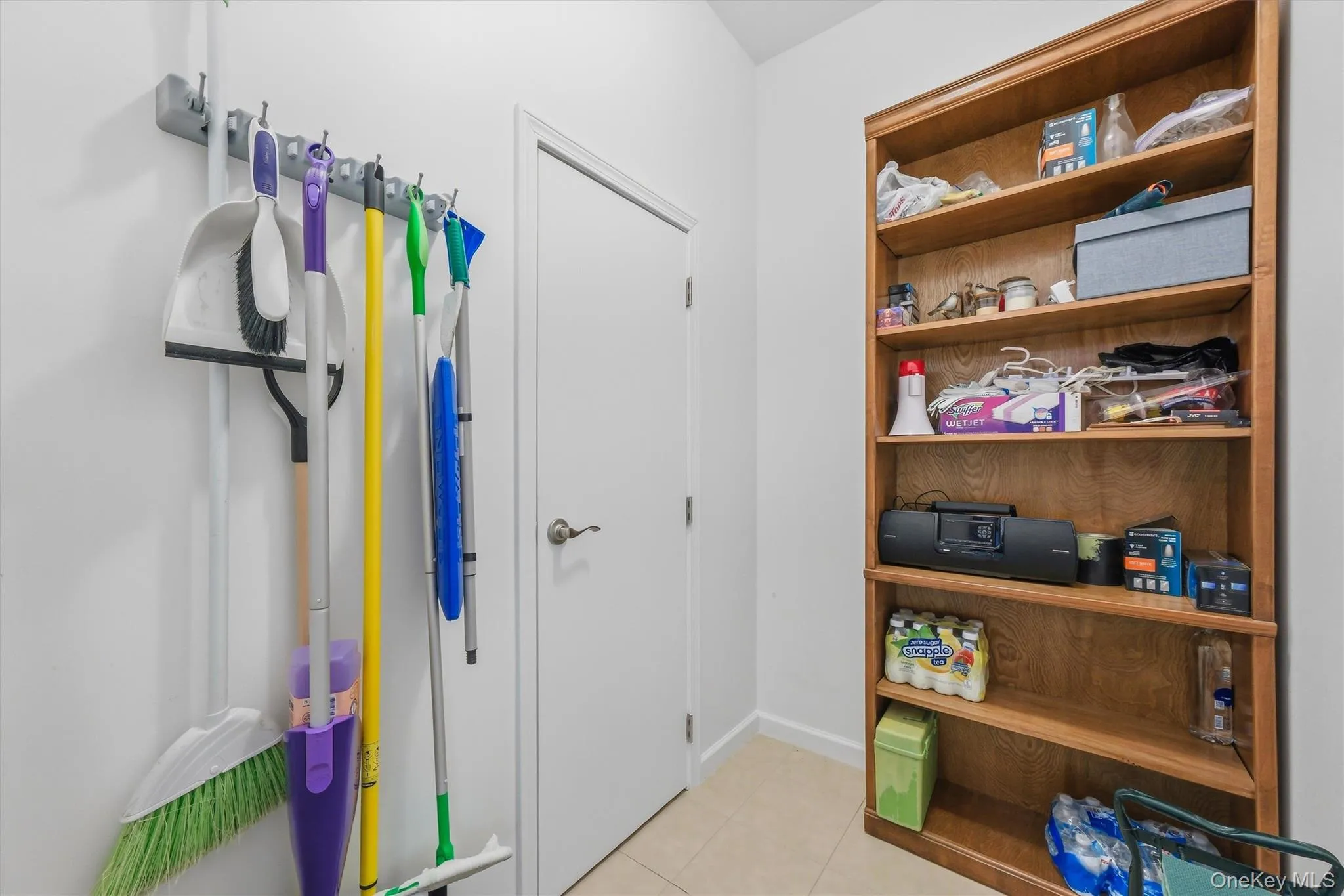 Additional storage space in the laundry room and entrance to the utility closet. Additional storage space in the laundry room and entrance to the utility closet.