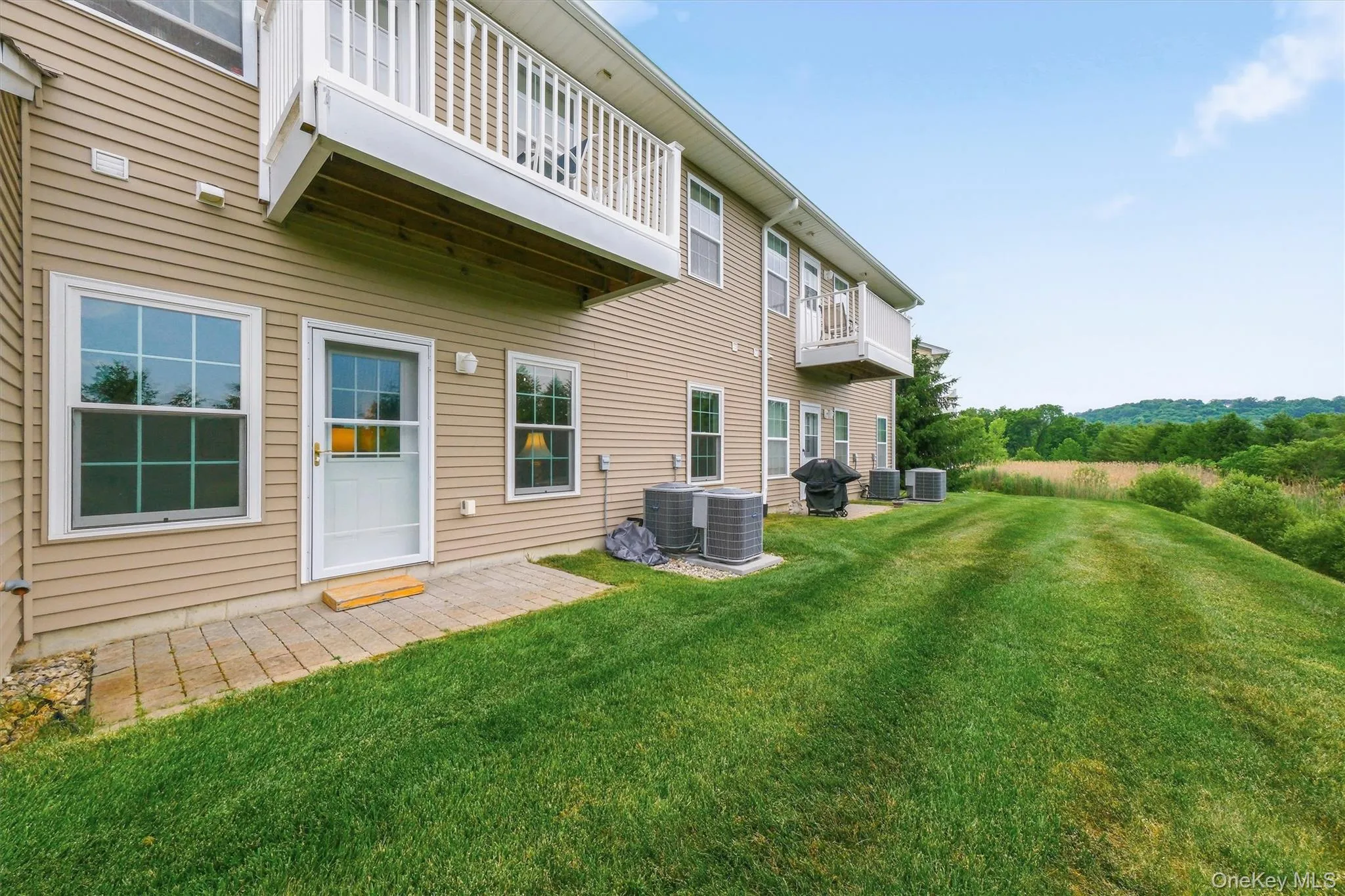 Back patio overlooks scenic rolling hills. Back patio overlooks scenic rolling hills.