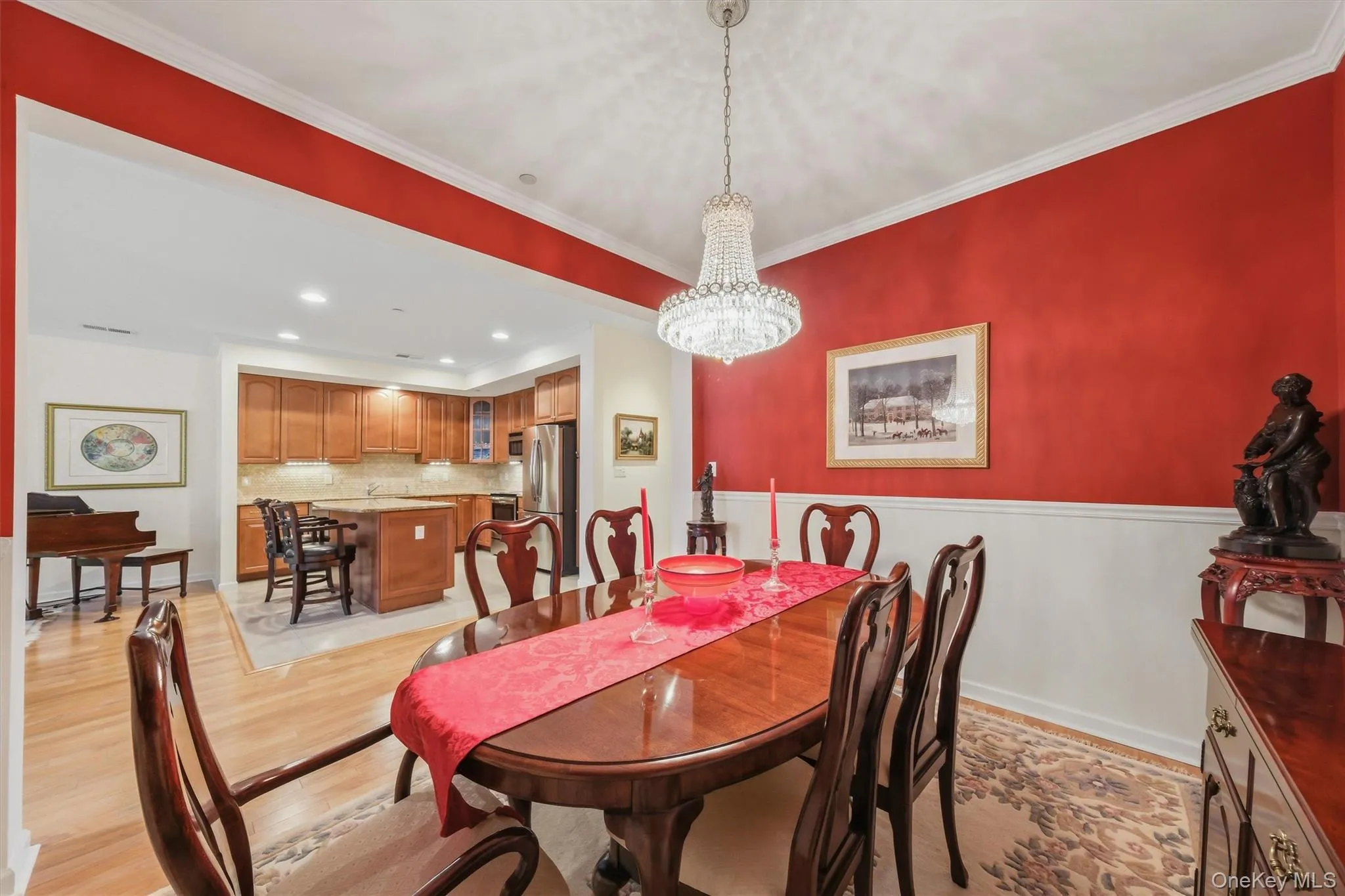Open-concept dining room with a refined yet inviting atmosphere. Open-concept dining room with a refined yet inviting atmosphere.