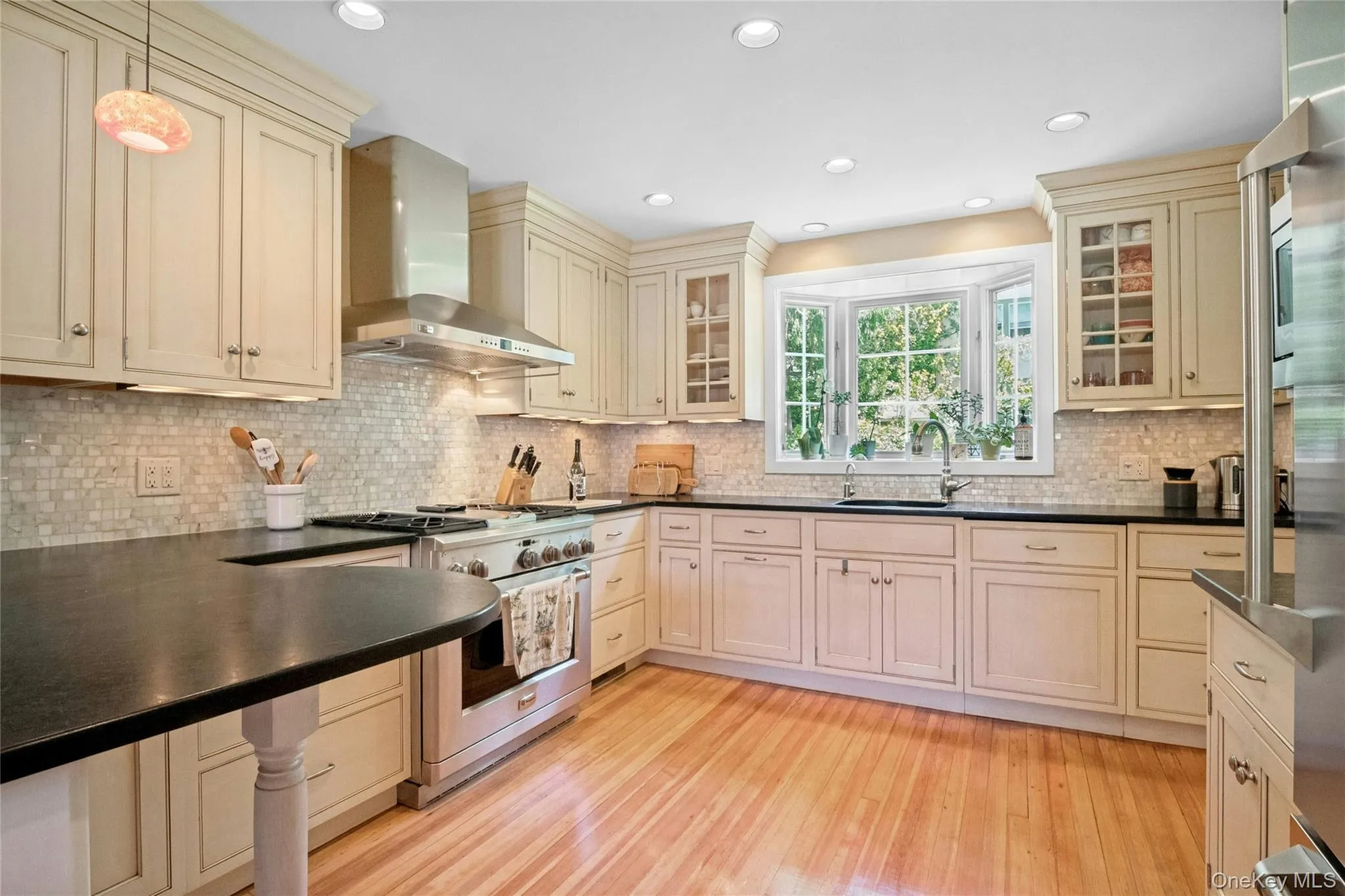 Wood floors throughout this lovely home Wood floors throughout this lovely home