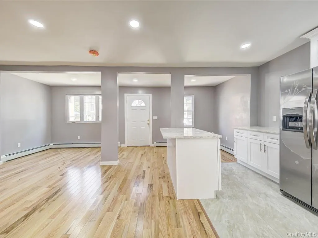 Another picture of the open kitchen and dining area. Another picture of the open kitchen and dining area.