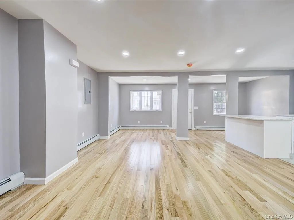 All new hardwood floors which opens towards Kitchen with Granite countertop. All new hardwood floors which opens towards Kitchen with Granite countertop.