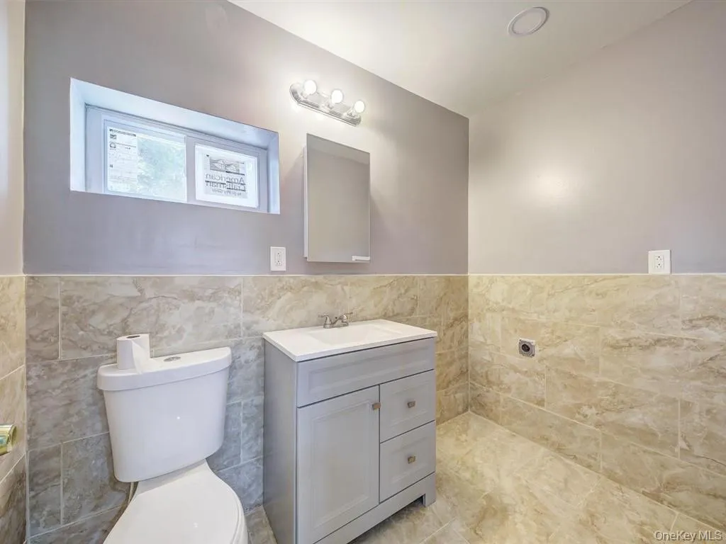 Newly renovated Half bath with washer and dryer hookup Newly renovated Half bath with washer and dryer hookup