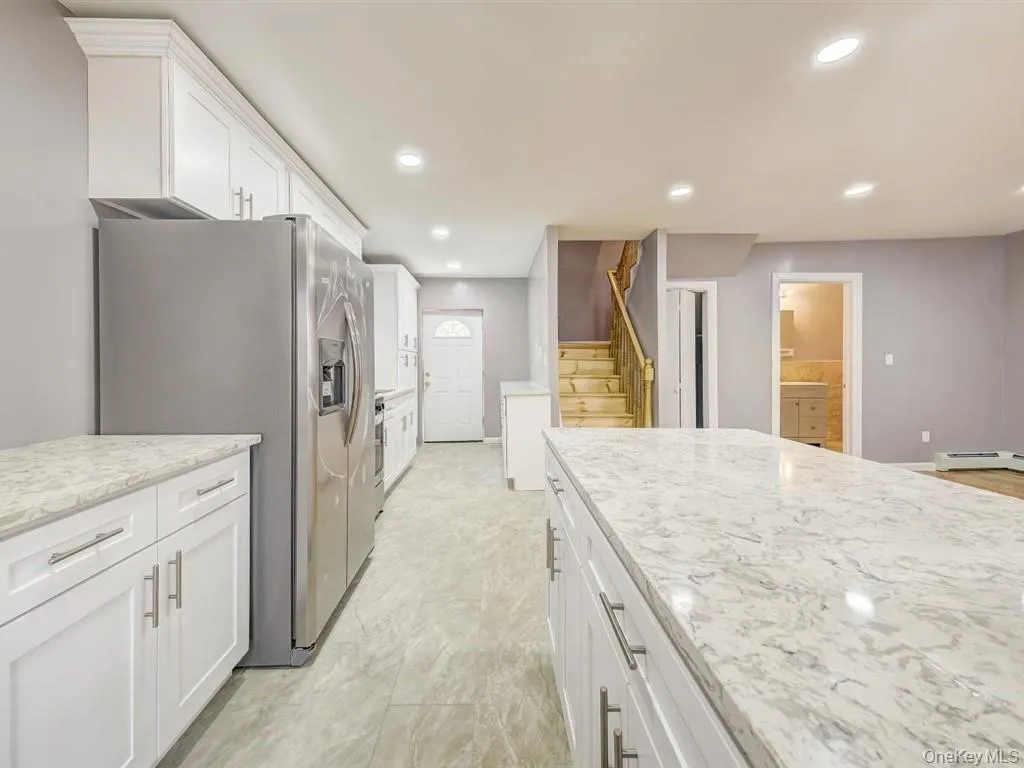 Huge Island for entertaining and a lot of counter space in the Kitchen Huge Island for entertaining and a lot of counter space in the Kitchen
