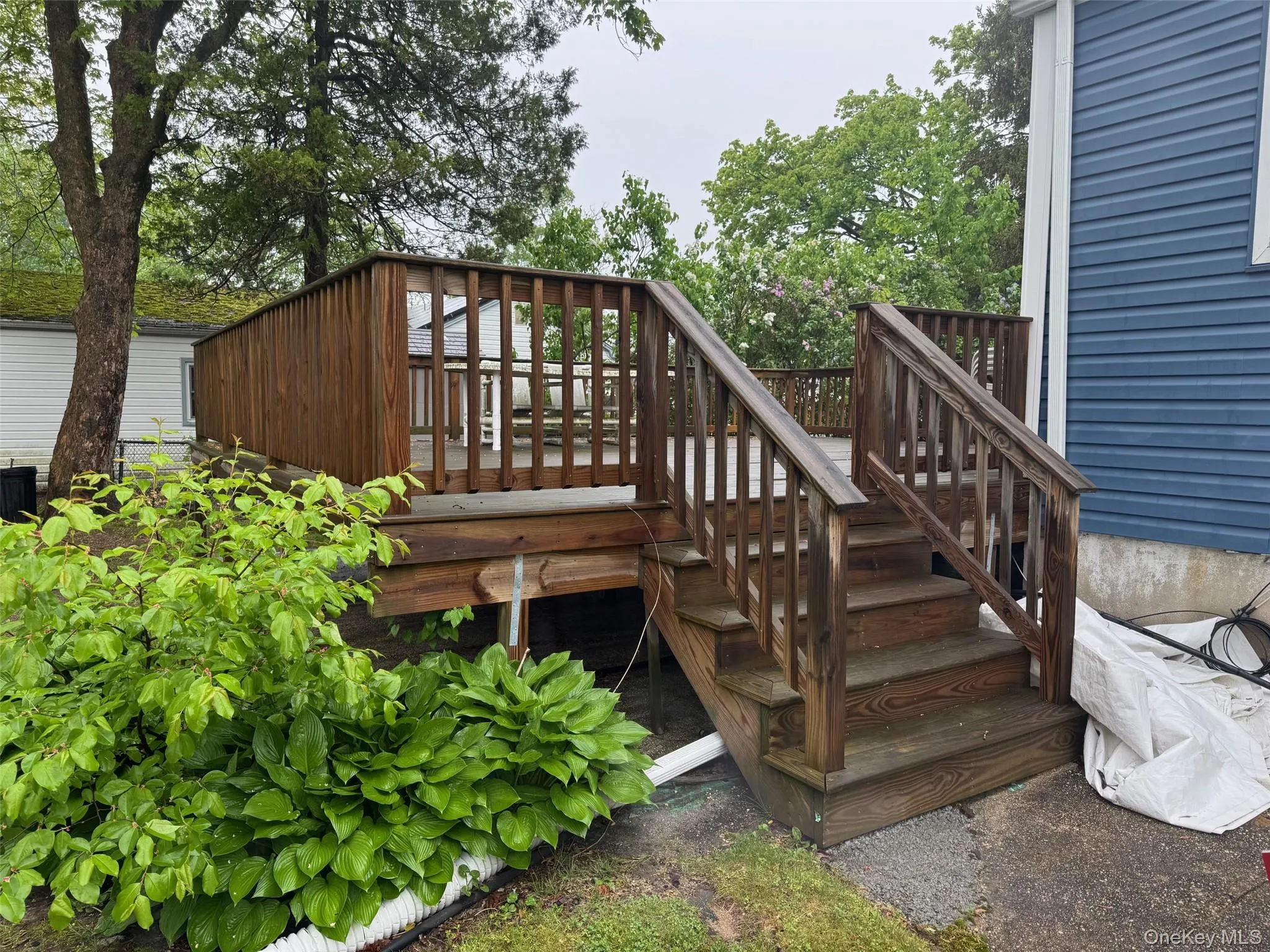 Wooden deck with stairs Wooden deck with stairs
