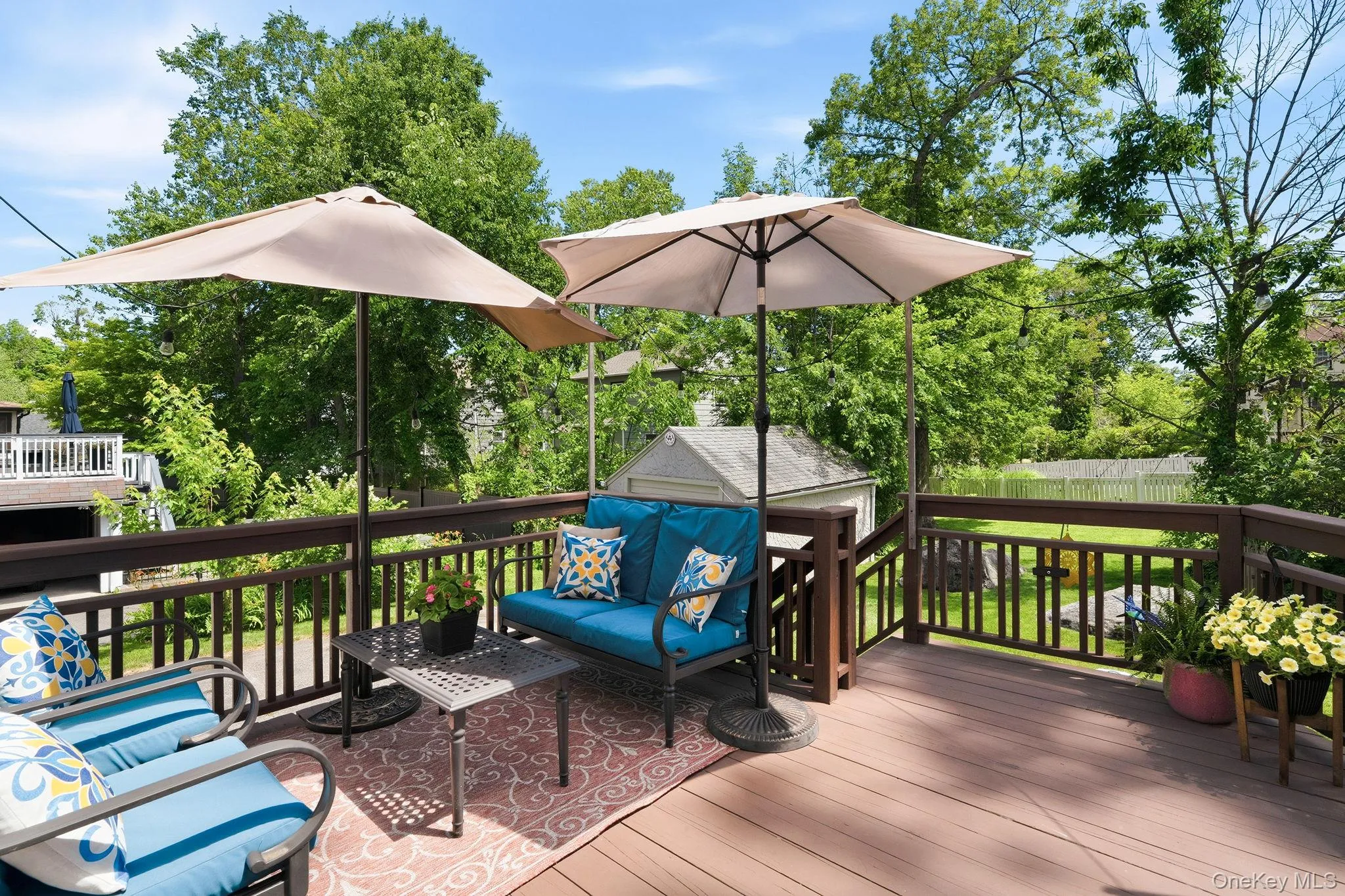 Just off the kitchen, the wooden deck extends the living space outdoors, complete with a patio and BBQ area ideal for effortless entertaining. Just off the kitchen, the wooden deck extends the living space outdoors, complete with a patio and BBQ area ideal for effortless entertaining.