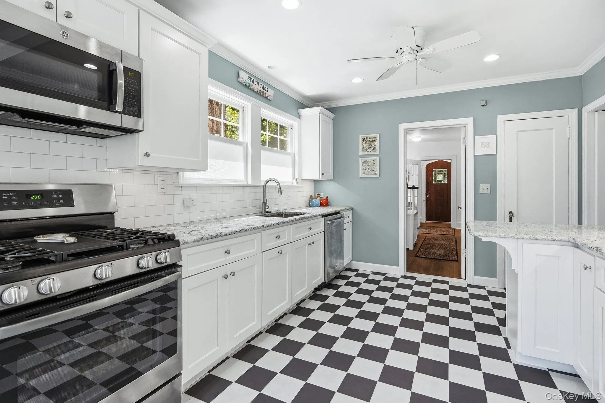 A classic checkered floor adds timeless character and a subtle design statement to this beautifully updated kitchen. A classic checkered floor adds timeless character and a subtle design statement to this beautifully updated kitchen.