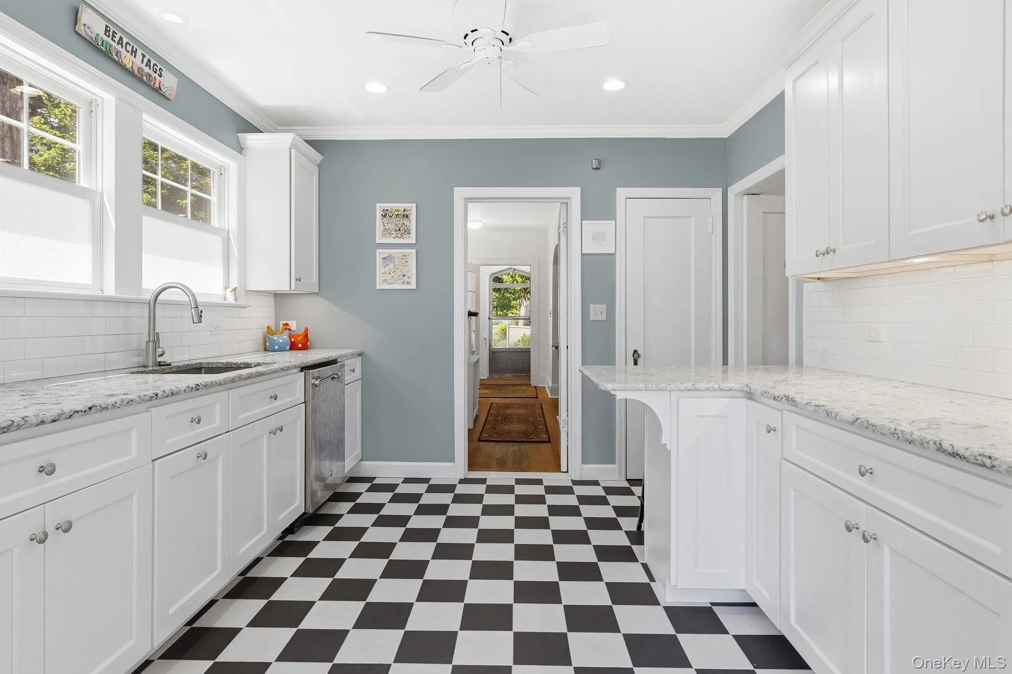 Crisp subway tile backsplash offers a clean, timeless backdrop that enhances the kitchen’s refined style. Crisp subway tile backsplash offers a clean, timeless backdrop that enhances the kitchen’s refined style.