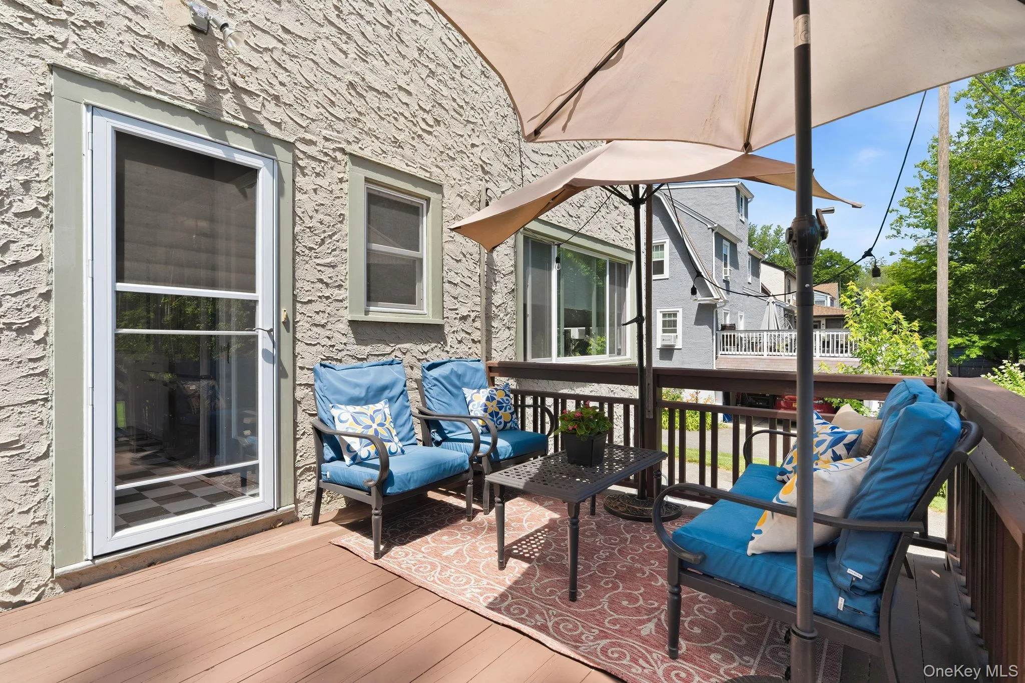 Step outside to a private wooden deck featuring a patio and BBQ area, creating the perfect setting for dining, entertaining, and relaxing outdoors. Step outside to a private wooden deck featuring a patio and BBQ area, creating the perfect setting for dining, entertaining, and relaxing outdoors.